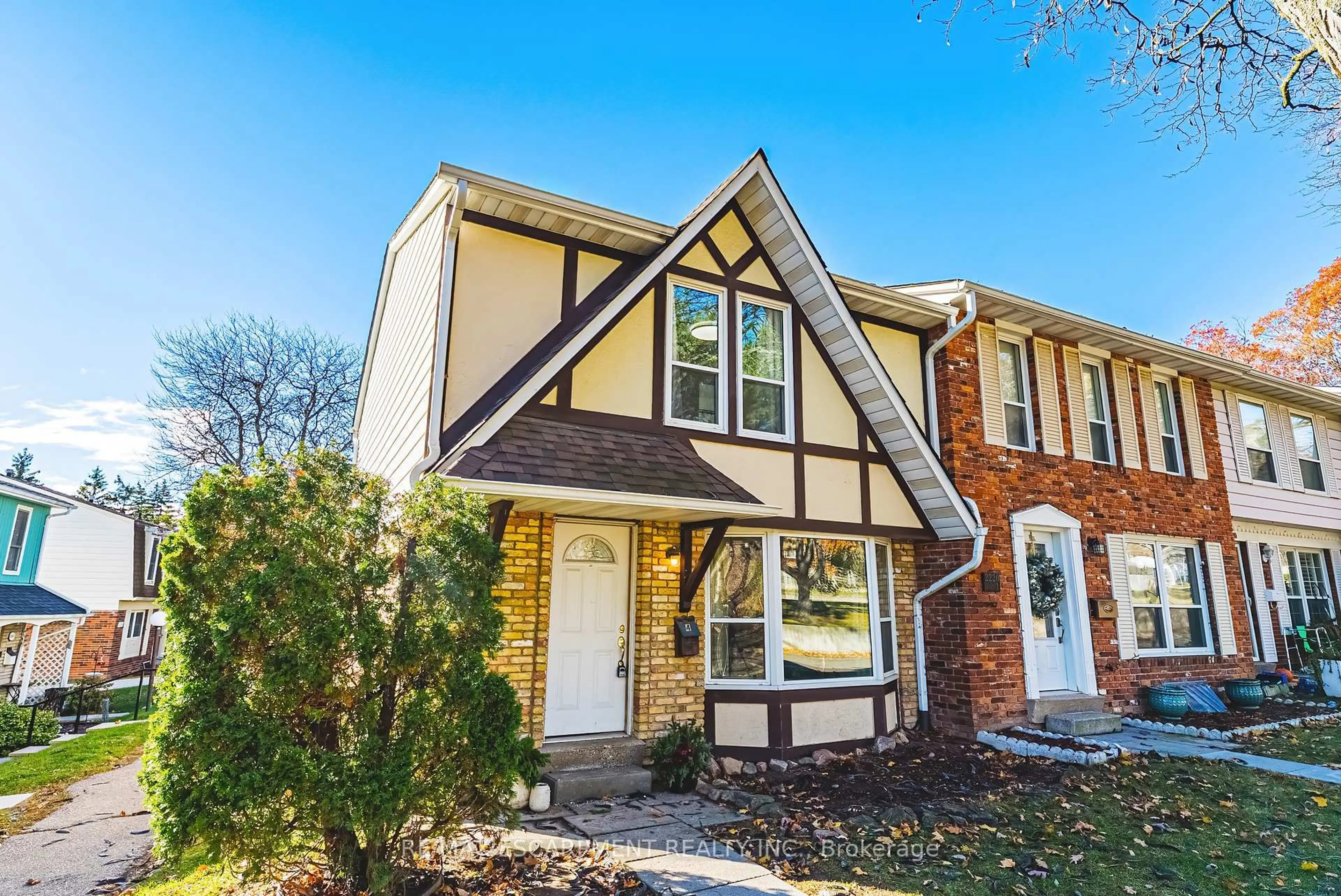 Home with brick exterior material, street for 2220 UPPER MIDDLE Rd #4, Burlington Ontario L7P 3P4