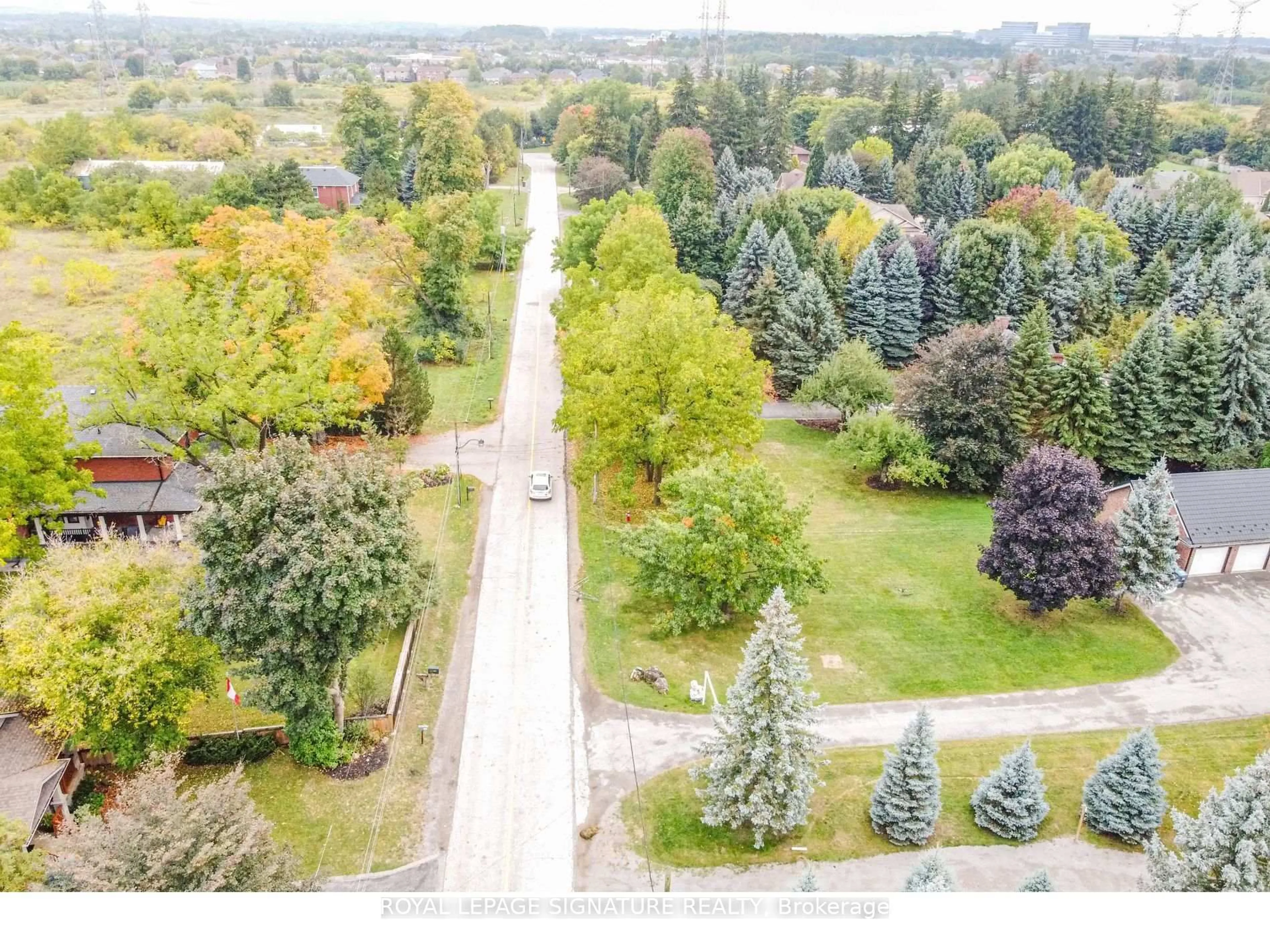 A pic from outside/outdoor area/front of a property/back of a property/a pic from drone, forest/trees view for 7596 Creditview Rd, Brampton Ontario L6Y 0G5