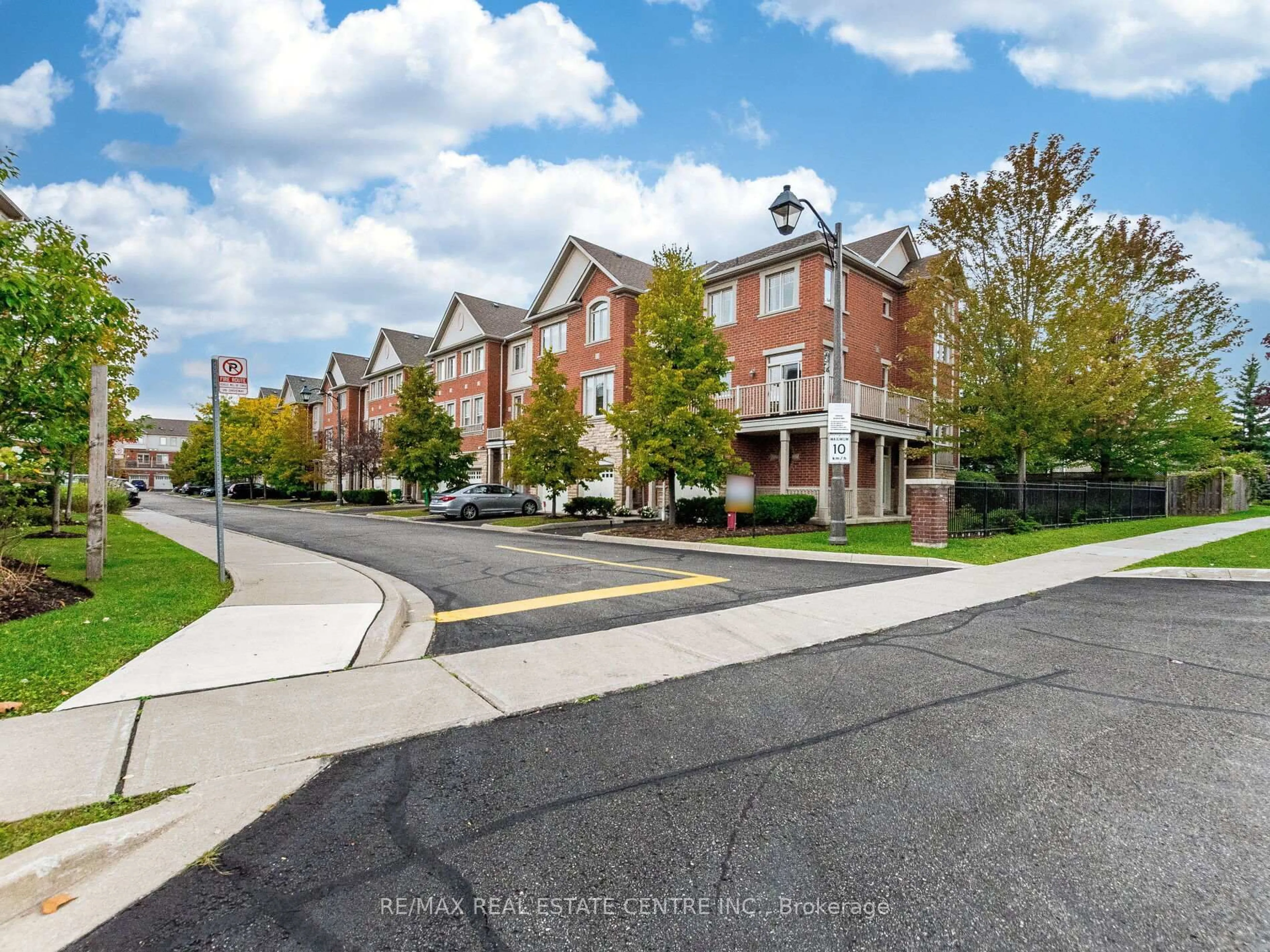 A pic from outside/outdoor area/front of a property/back of a property/a pic from drone, street for 5710 Long Valley Rd #1, Mississauga Ontario L5M 0M1