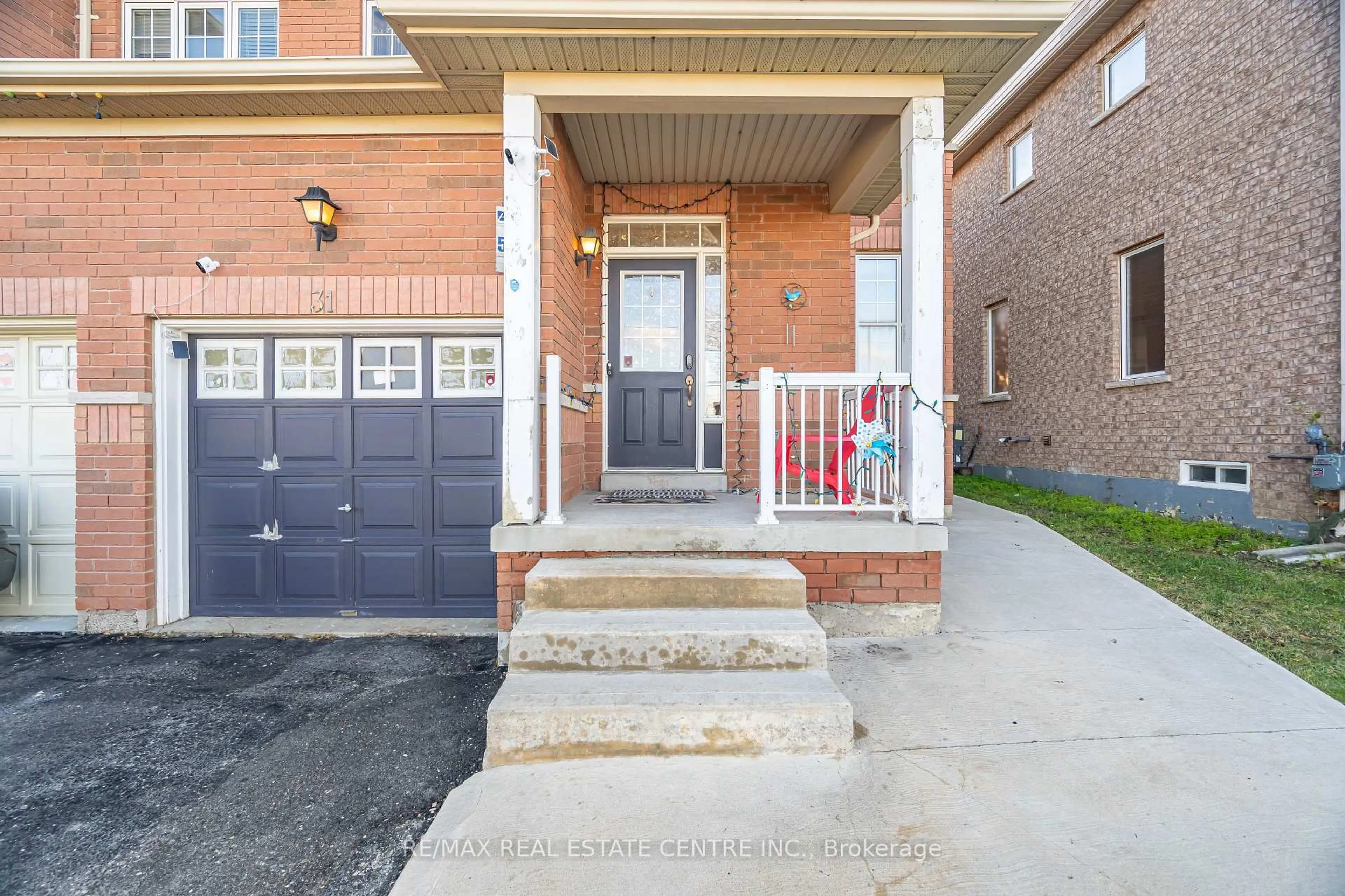 Home with brick exterior material, street for 31 Connolly Cres, Brampton Ontario L6R 0G9