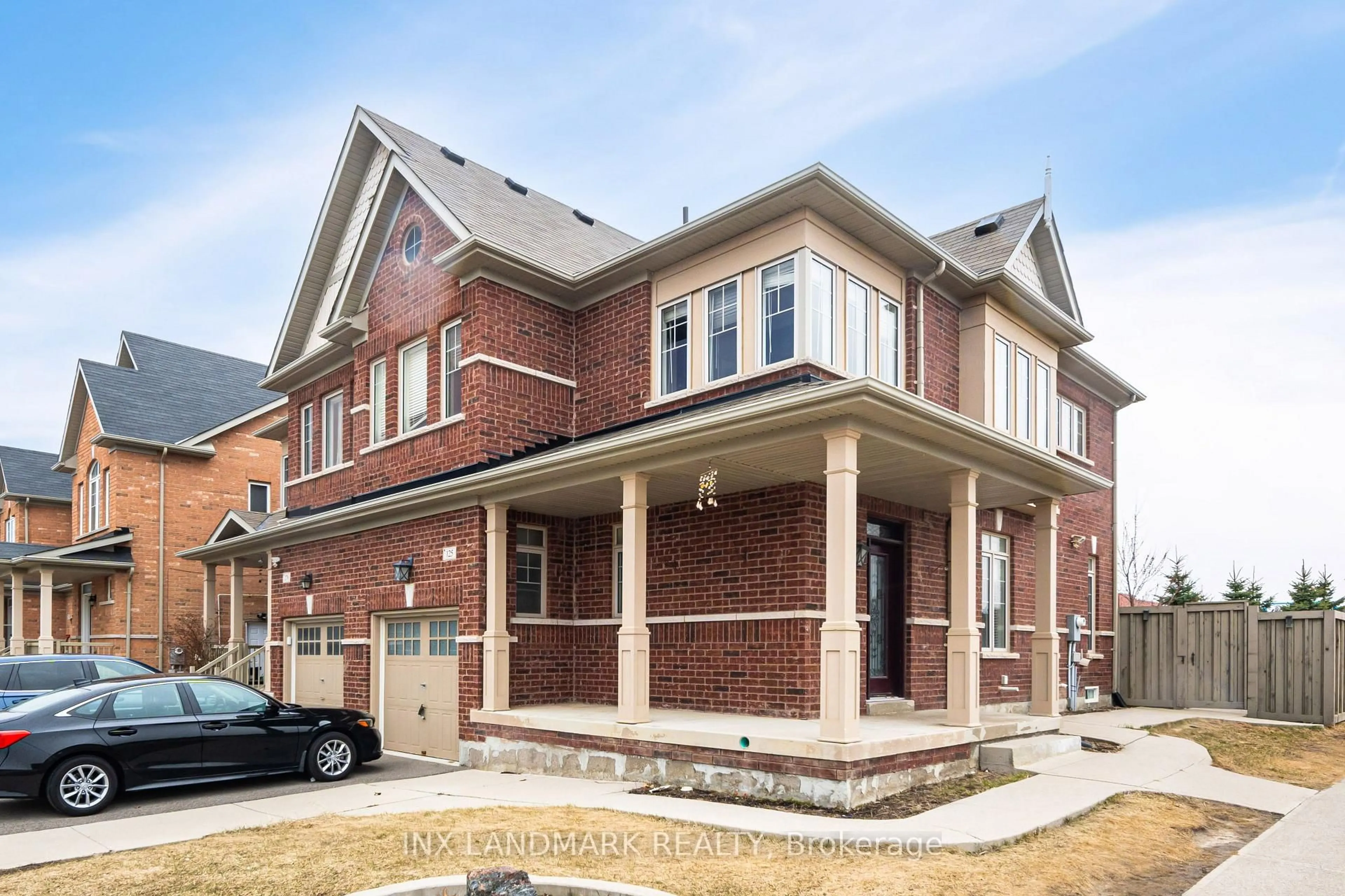 Home with brick exterior material, street for 125 Remembrance Rd, Brampton Ontario L7A 0A8