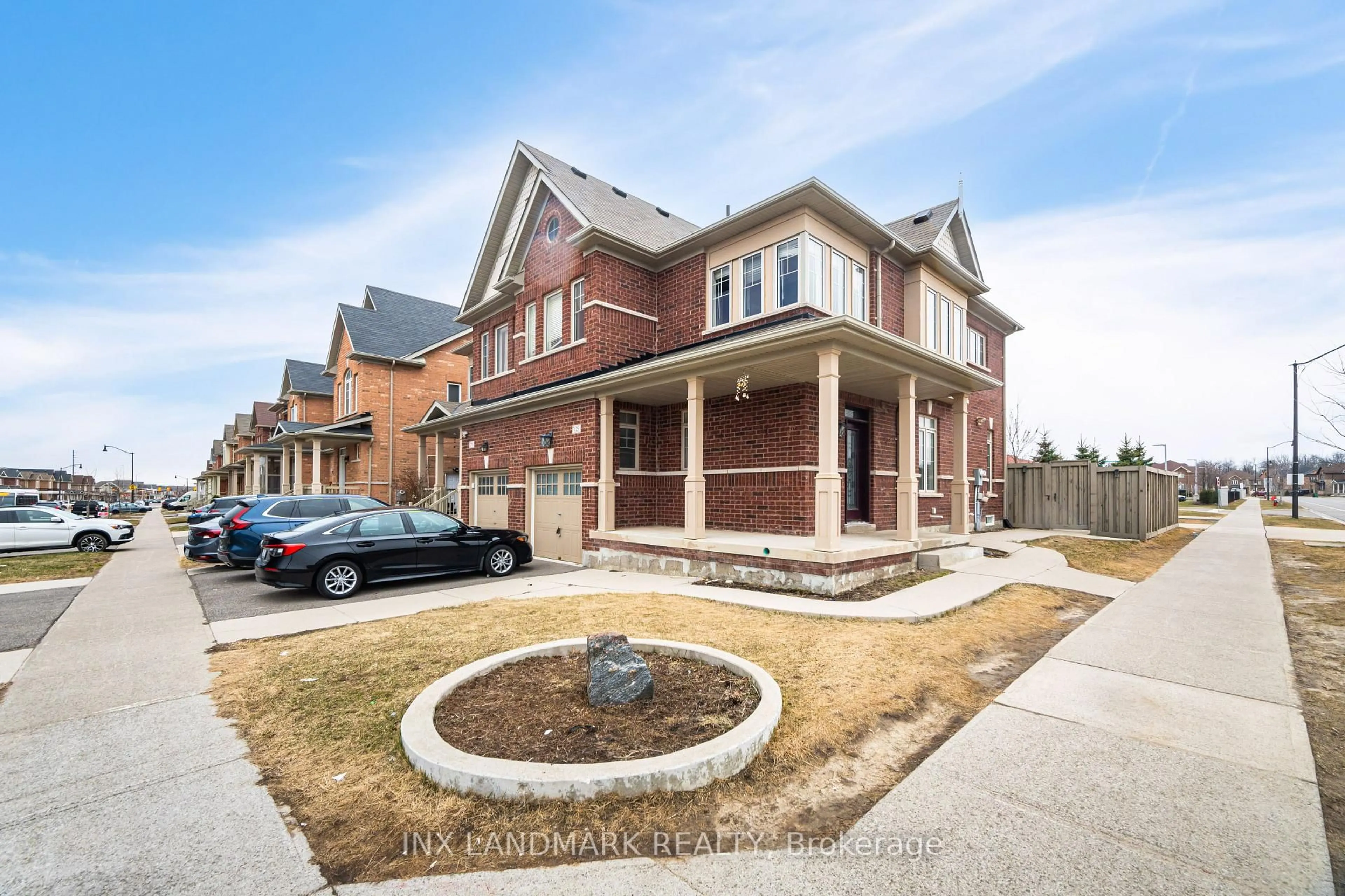 Home with brick exterior material, street for 125 Remembrance Rd, Brampton Ontario L7A 0A8