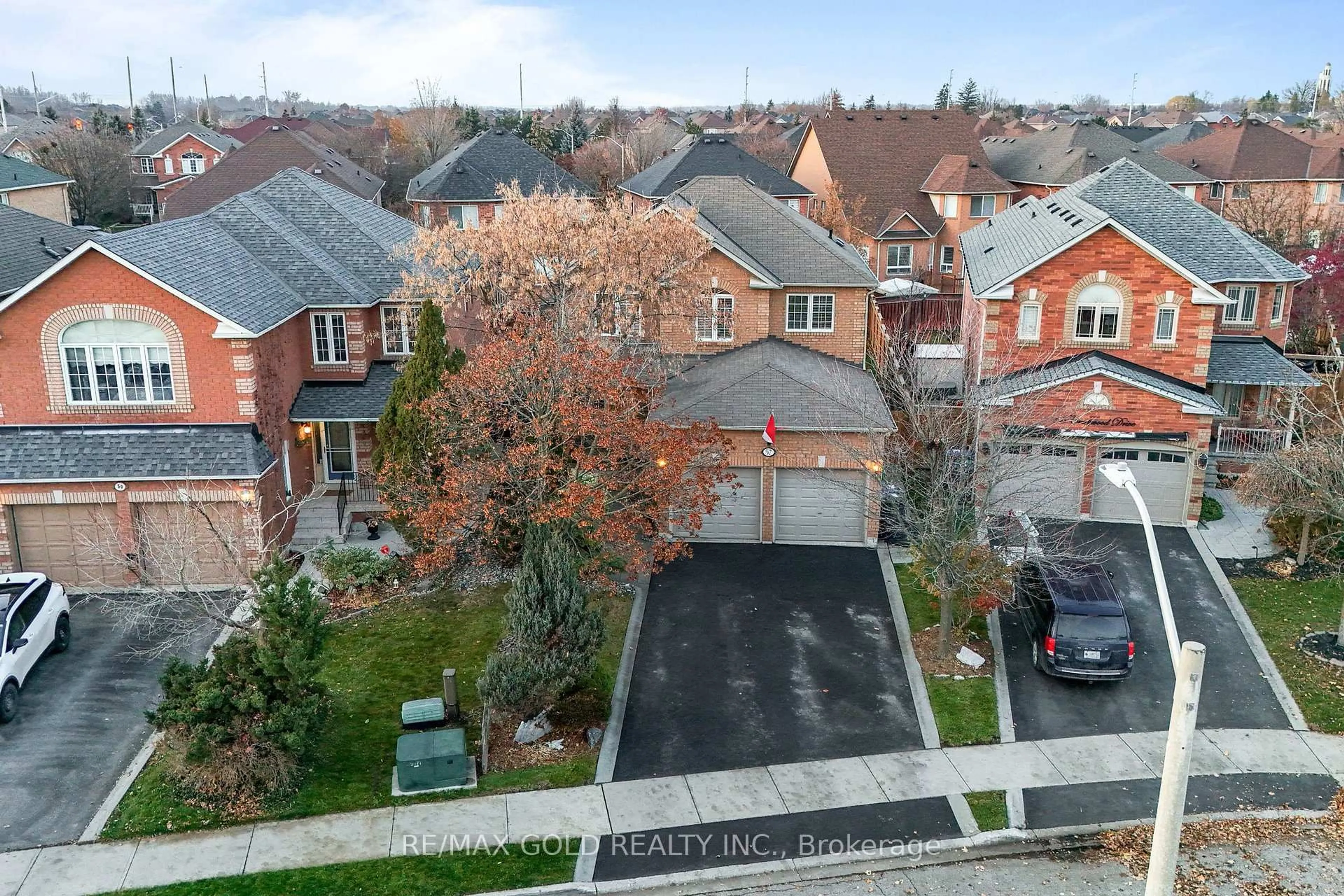 A pic from outside/outdoor area/front of a property/back of a property/a pic from drone, street for 57 Creekwood Dr, Brampton Ontario L7A 1J3