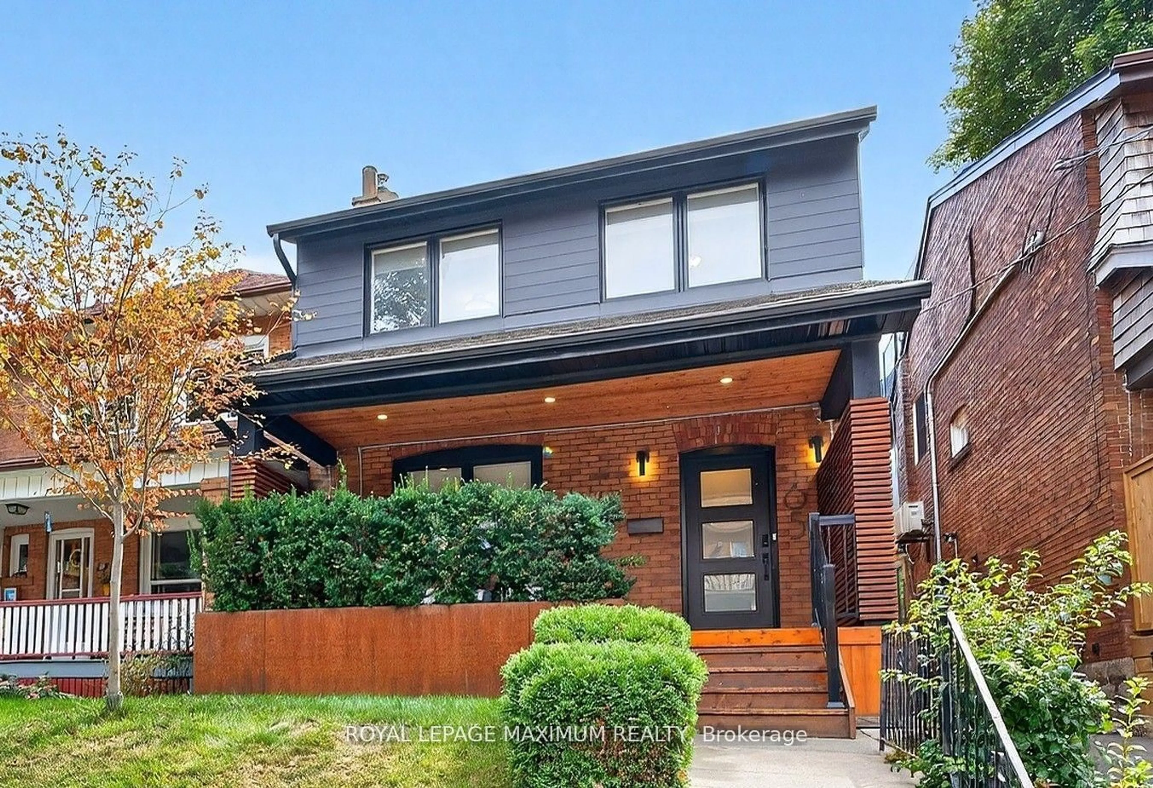 Home with brick exterior material, street for 65 Parkdale Rd, Toronto Ontario M6R 1E3