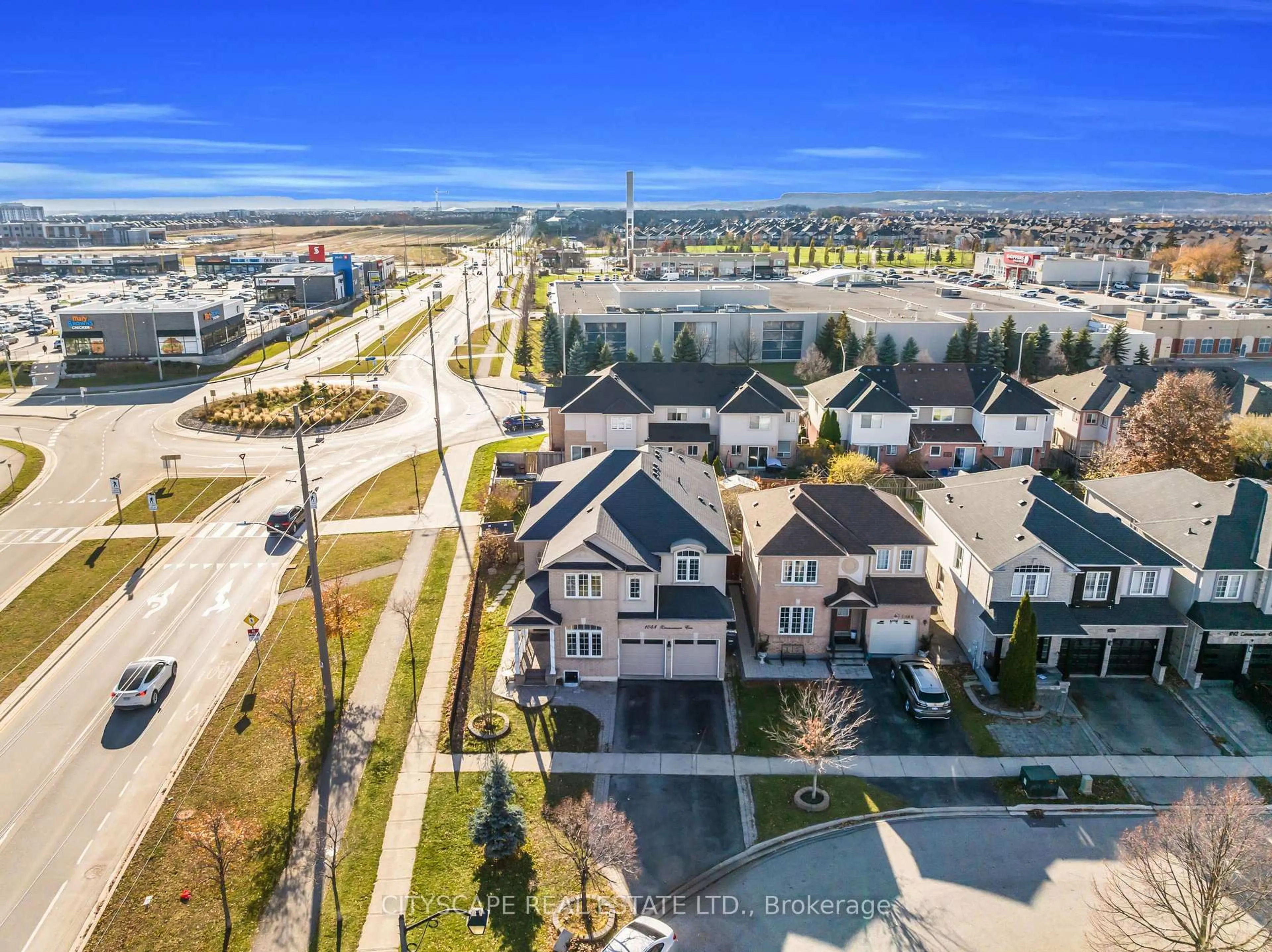 A pic from outside/outdoor area/front of a property/back of a property/a pic from drone, city buildings view from balcony for 1048 Zimmerman Cres, Milton Ontario L9T 5S6