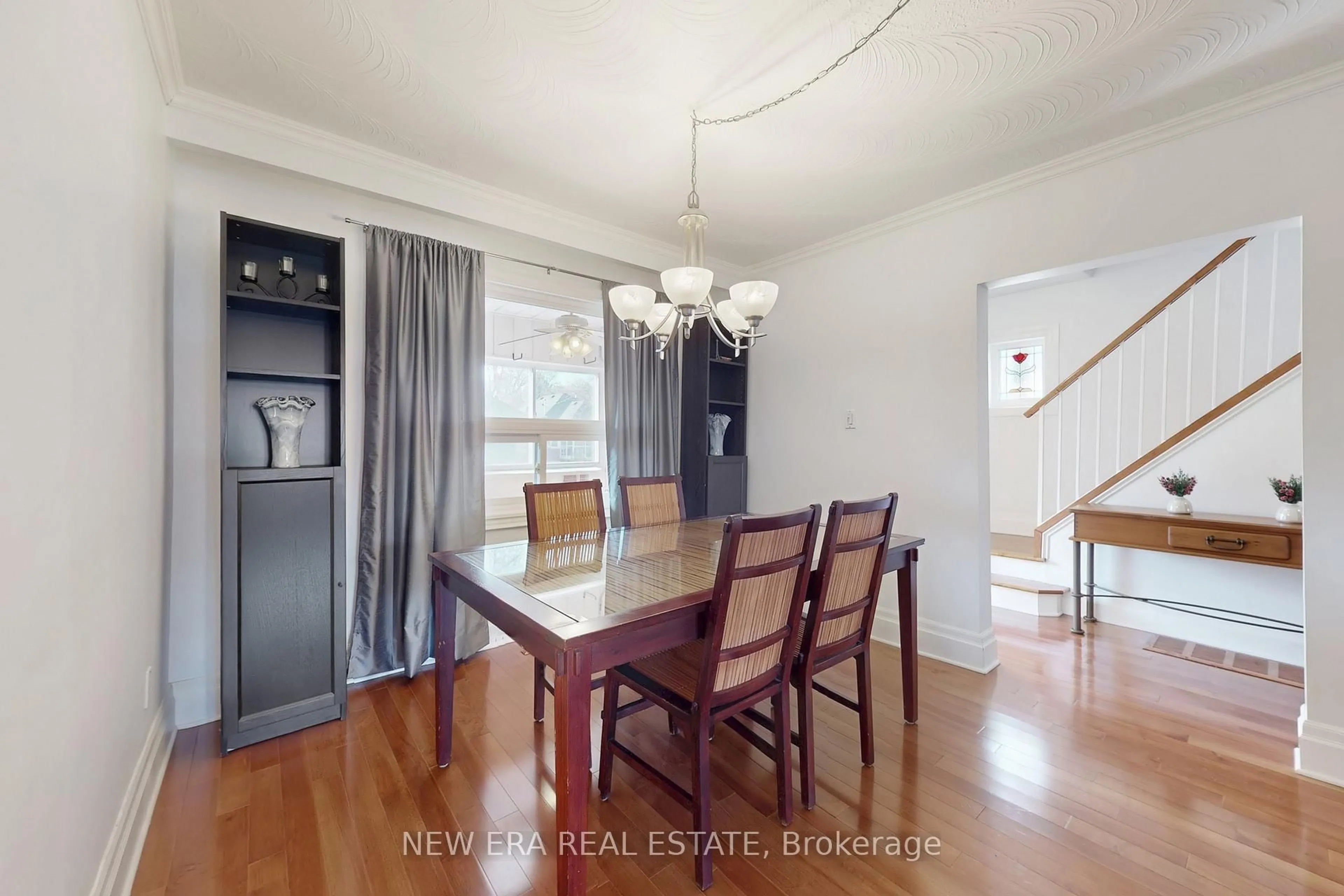 Dining room, wood/laminate floor for 119 Harvie Ave, Toronto Ontario M6E 4K4