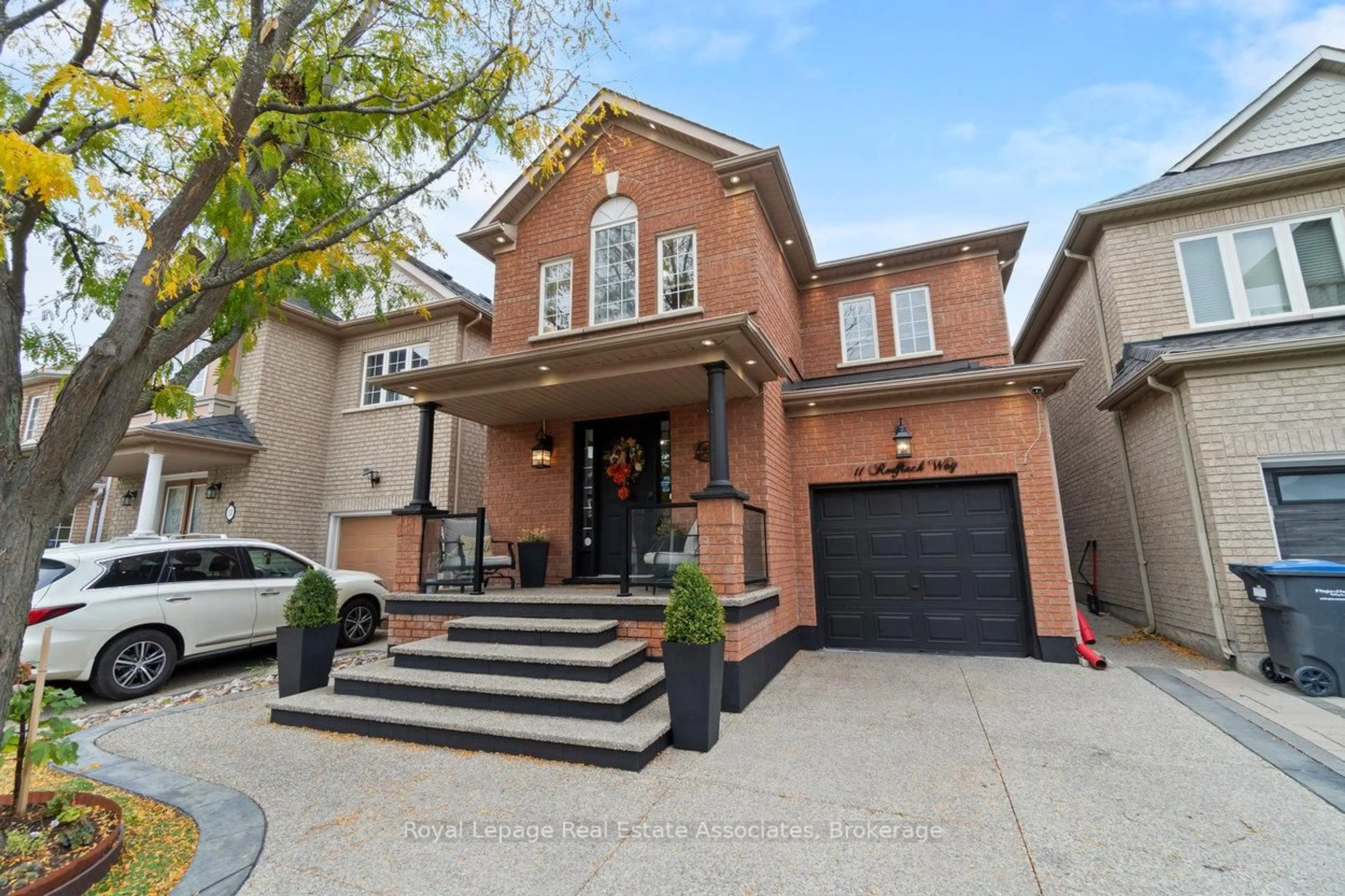Home with brick exterior material, street for 11 Redfinch Way, Brampton Ontario L7A 2B2