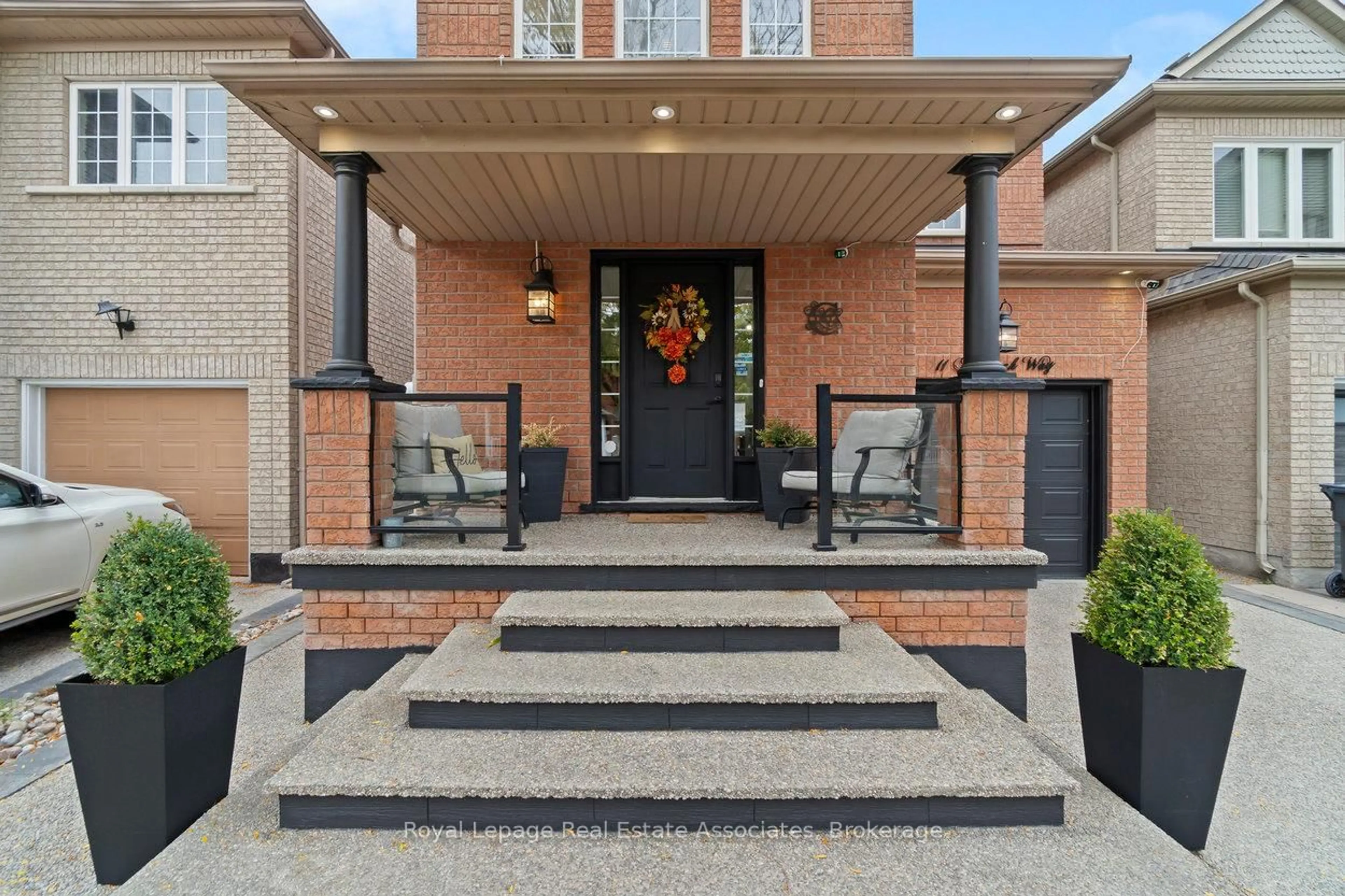 Home with brick exterior material, street for 11 Redfinch Way, Brampton Ontario L7A 2B2
