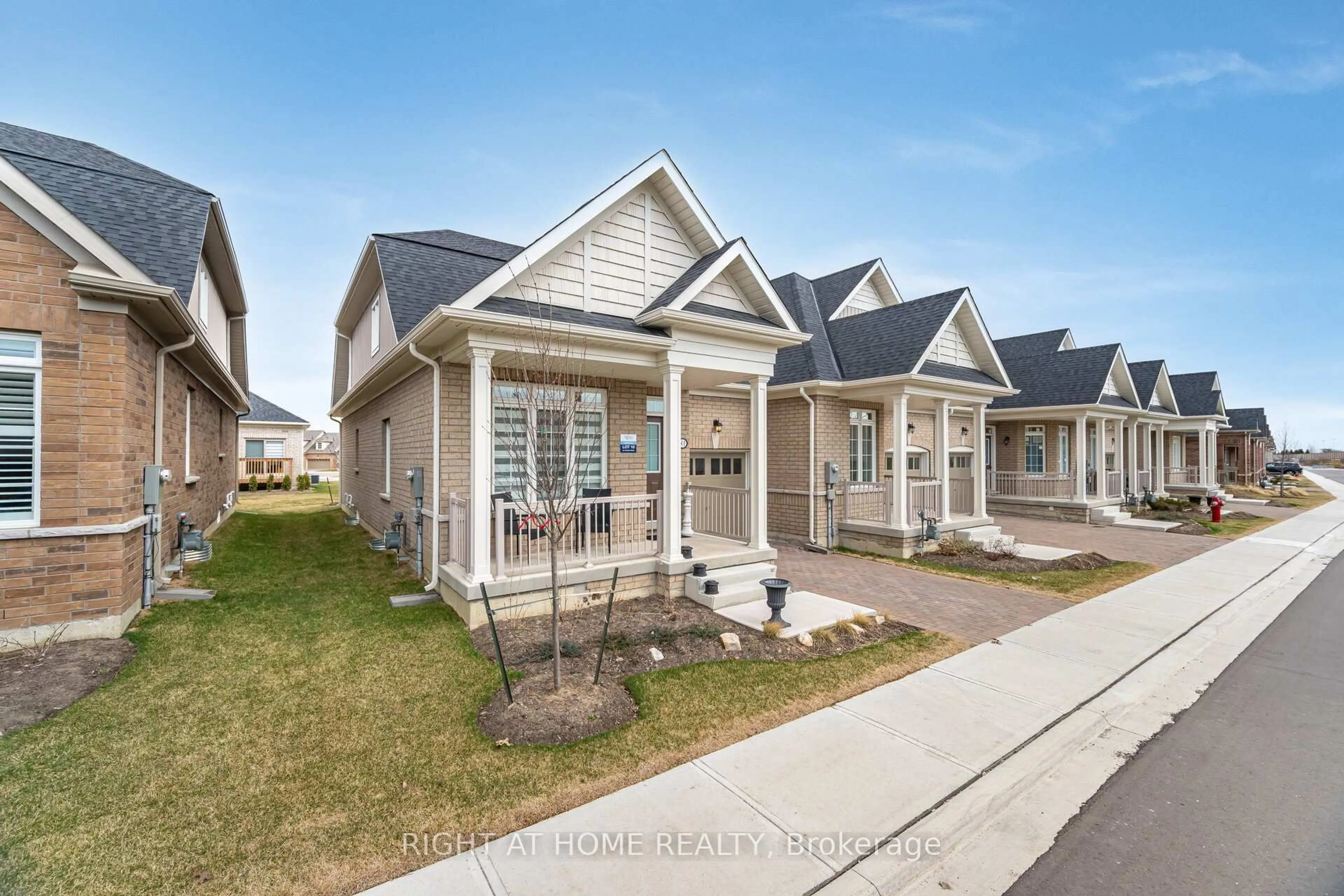 Home with vinyl exterior material, street for 81 Muzzo Dr, Brampton Ontario L6R 3Y4