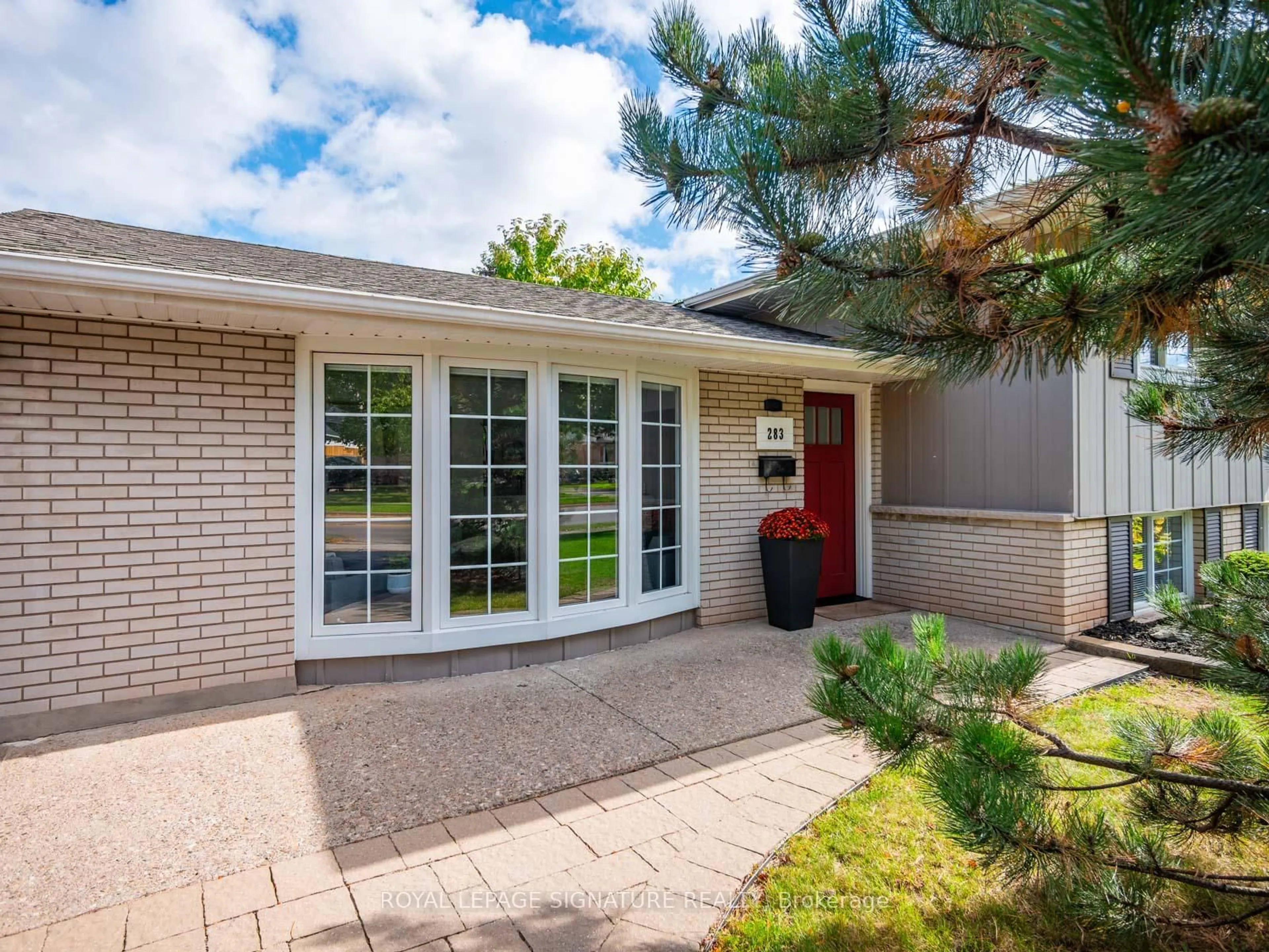 Home with brick exterior material, street for 283 Hampton Heath Rd, Burlington Ontario L7L 4P6