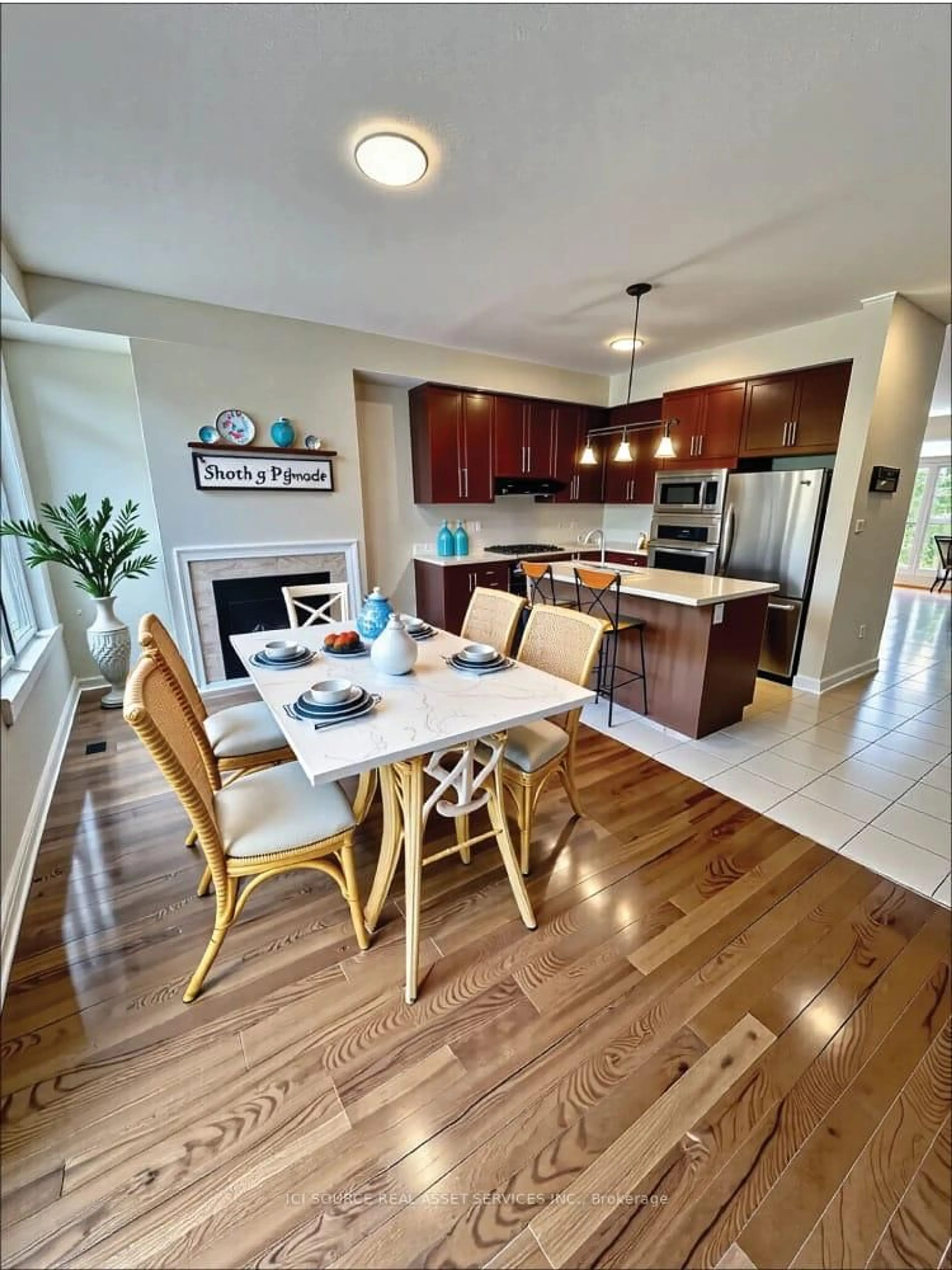 Open concept kitchen, wood/laminate floor for 3215 Thomas St #4, Mississauga Ontario L5M 0M2