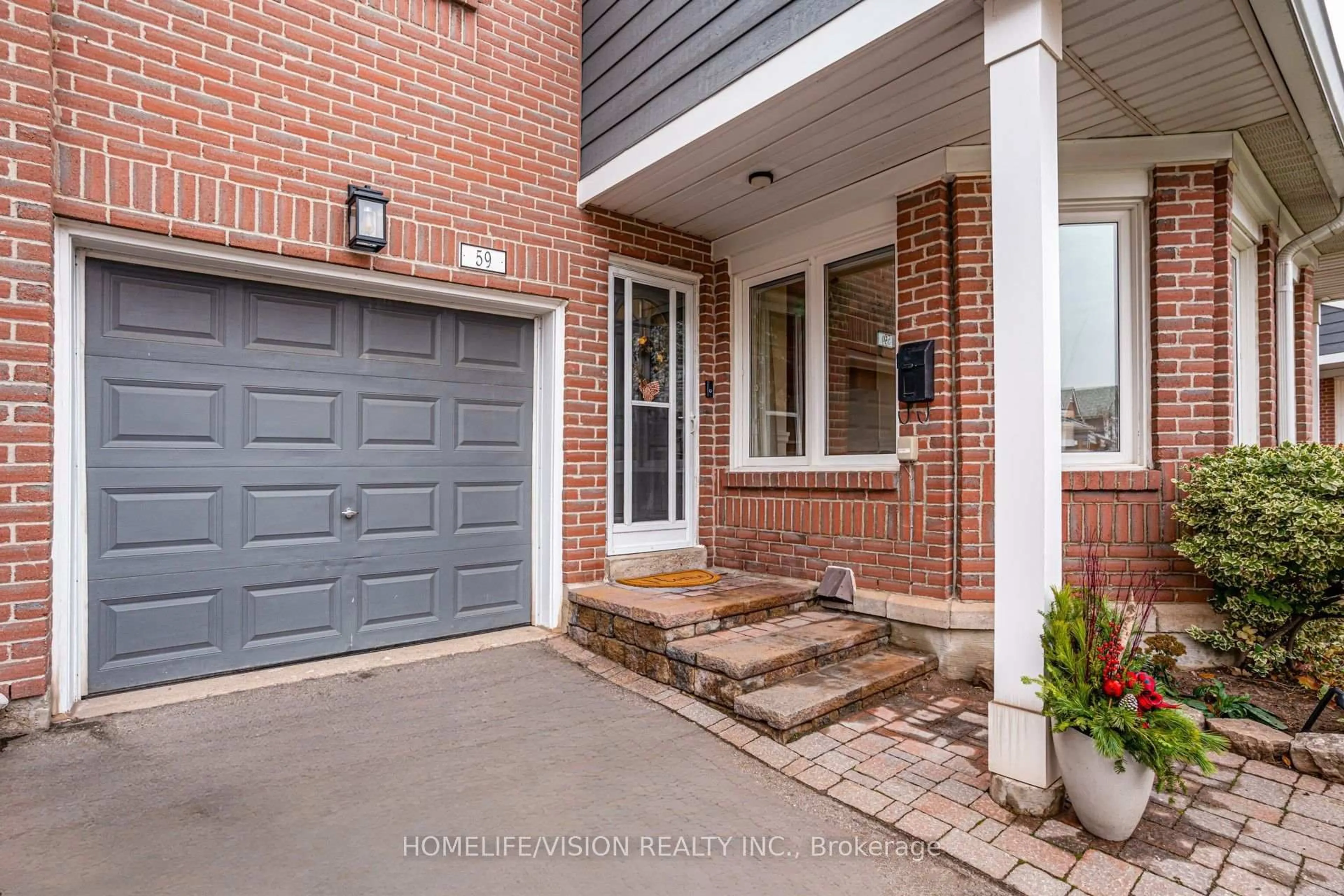 Home with brick exterior material, street for 2205 South Millway #59, Mississauga Ontario L5L 3T2