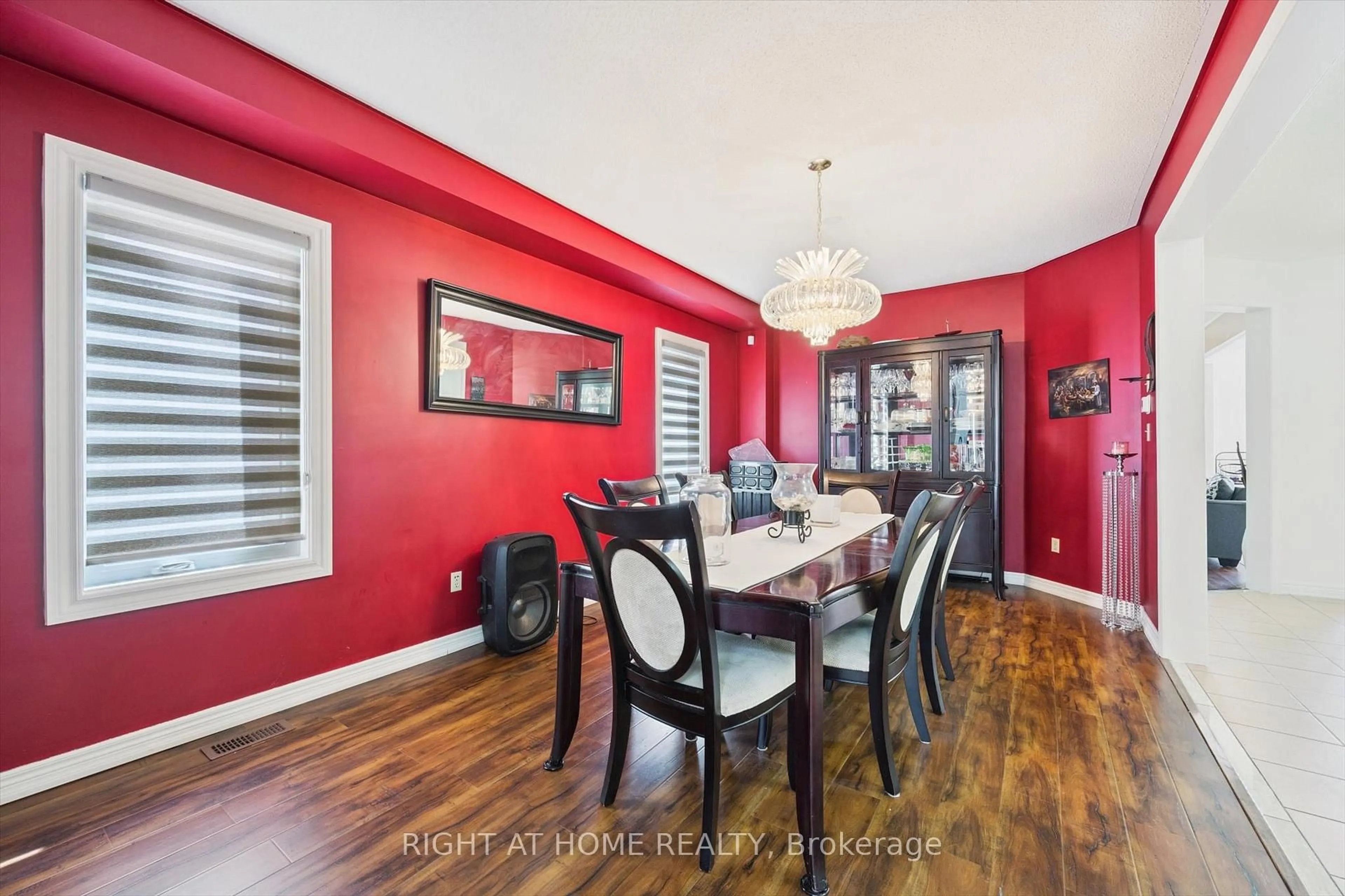 Dining room, wood/laminate floor for 38 Cape Dorset Cres, Brampton Ontario L6R 3L2