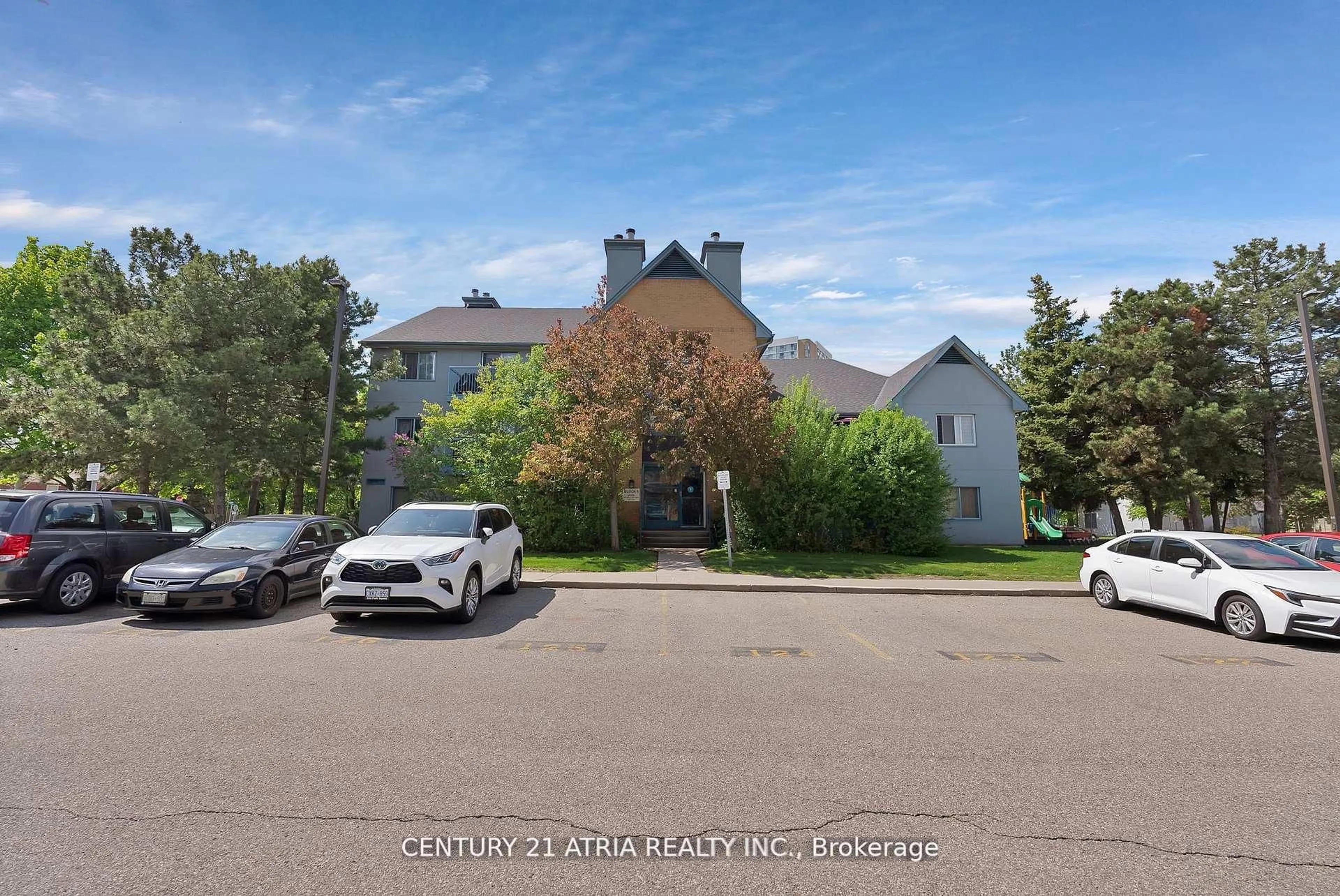 A pic from outside/outdoor area/front of a property/back of a property/a pic from drone, street for 65 Trailwood Dr #523, Mississauga Ontario L4Z 3L1