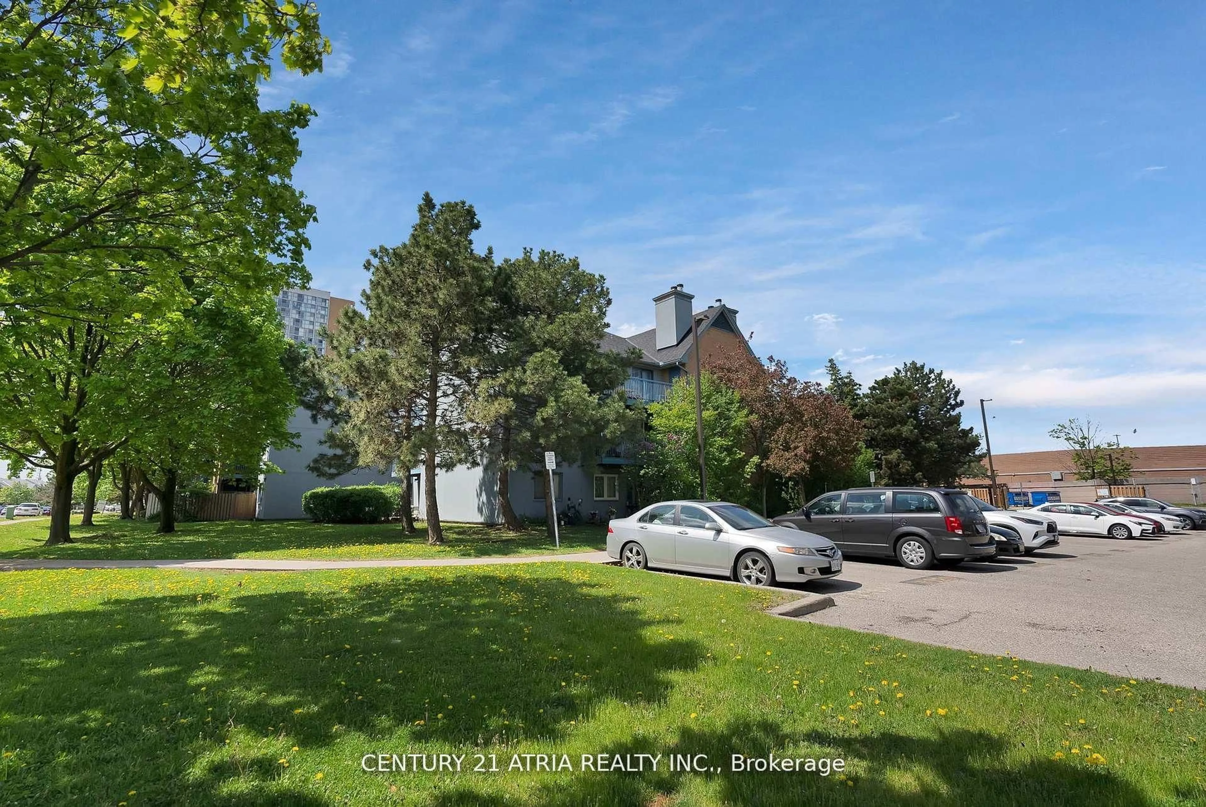 A pic from outside/outdoor area/front of a property/back of a property/a pic from drone, street for 65 Trailwood Dr #523, Mississauga Ontario L4Z 3L1