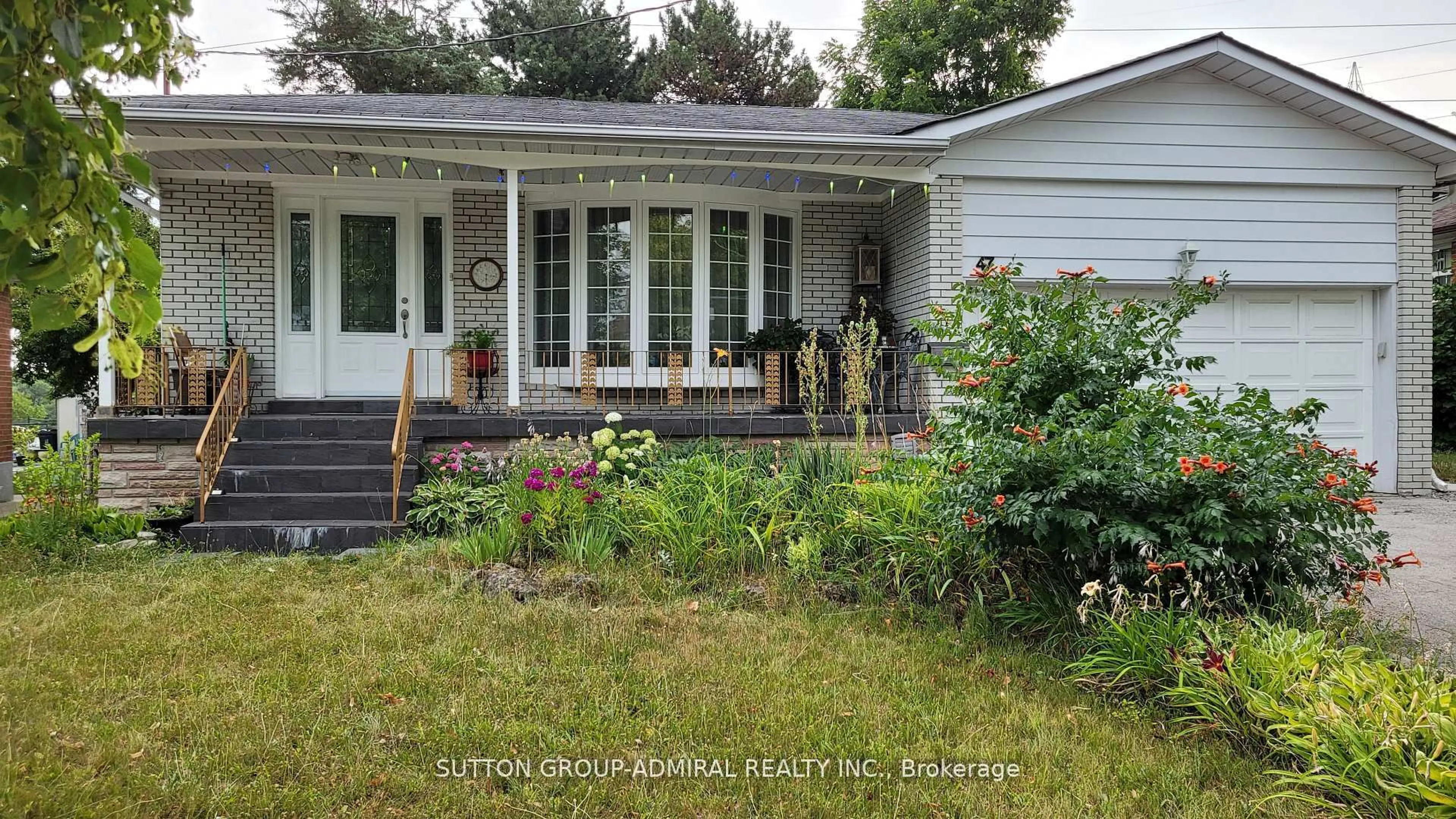 Home with vinyl exterior material, street for 47 Tobermory Dr, Toronto Ontario M3N 2R4