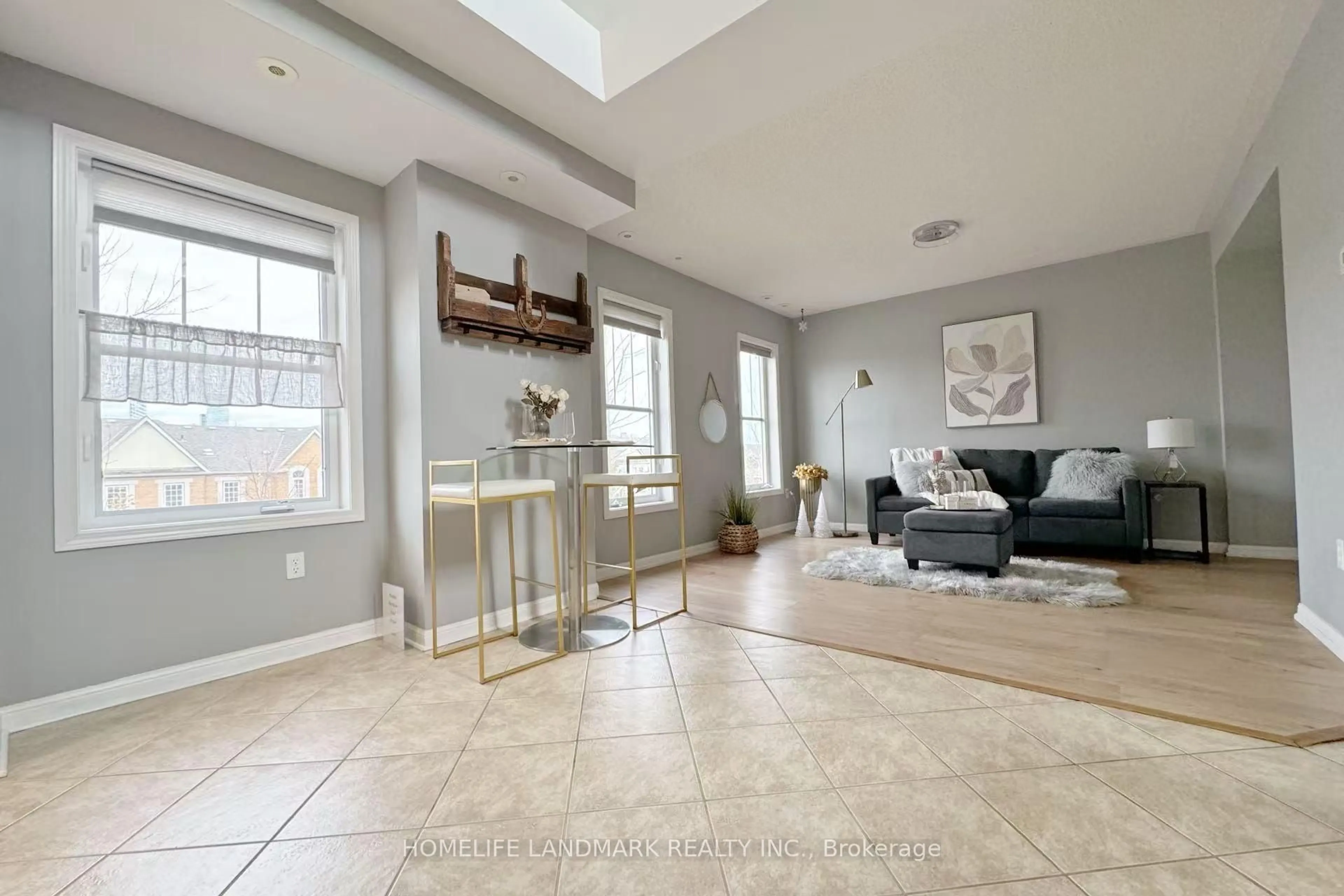 Living room with furniture, ceramic/tile floor for 580 Shoreline Dr #6, Mississauga Ontario L5B 0A8