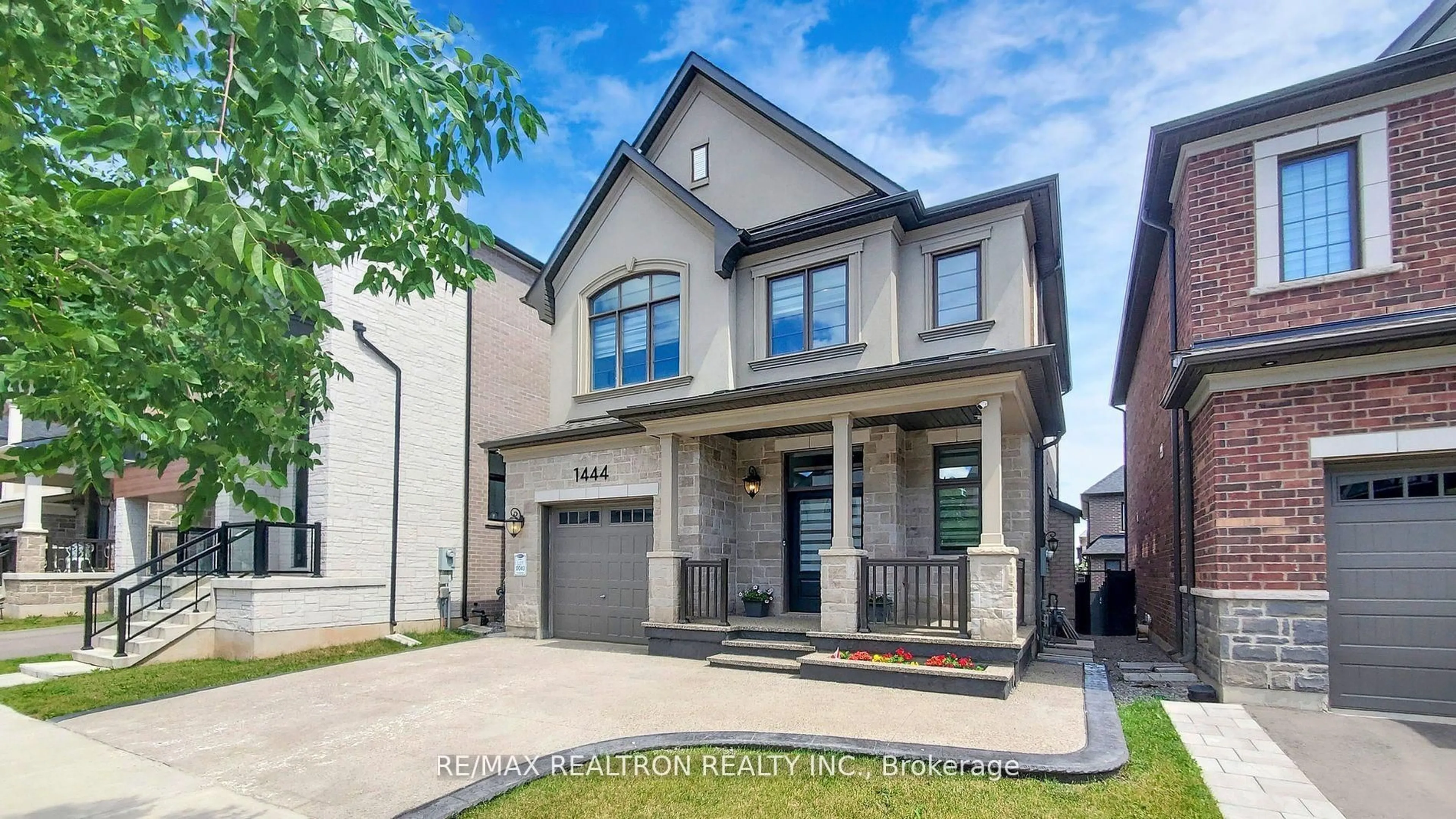 Home with brick exterior material, street for 1444 Varelas Passage, Oakville Ontario L6H 3S3