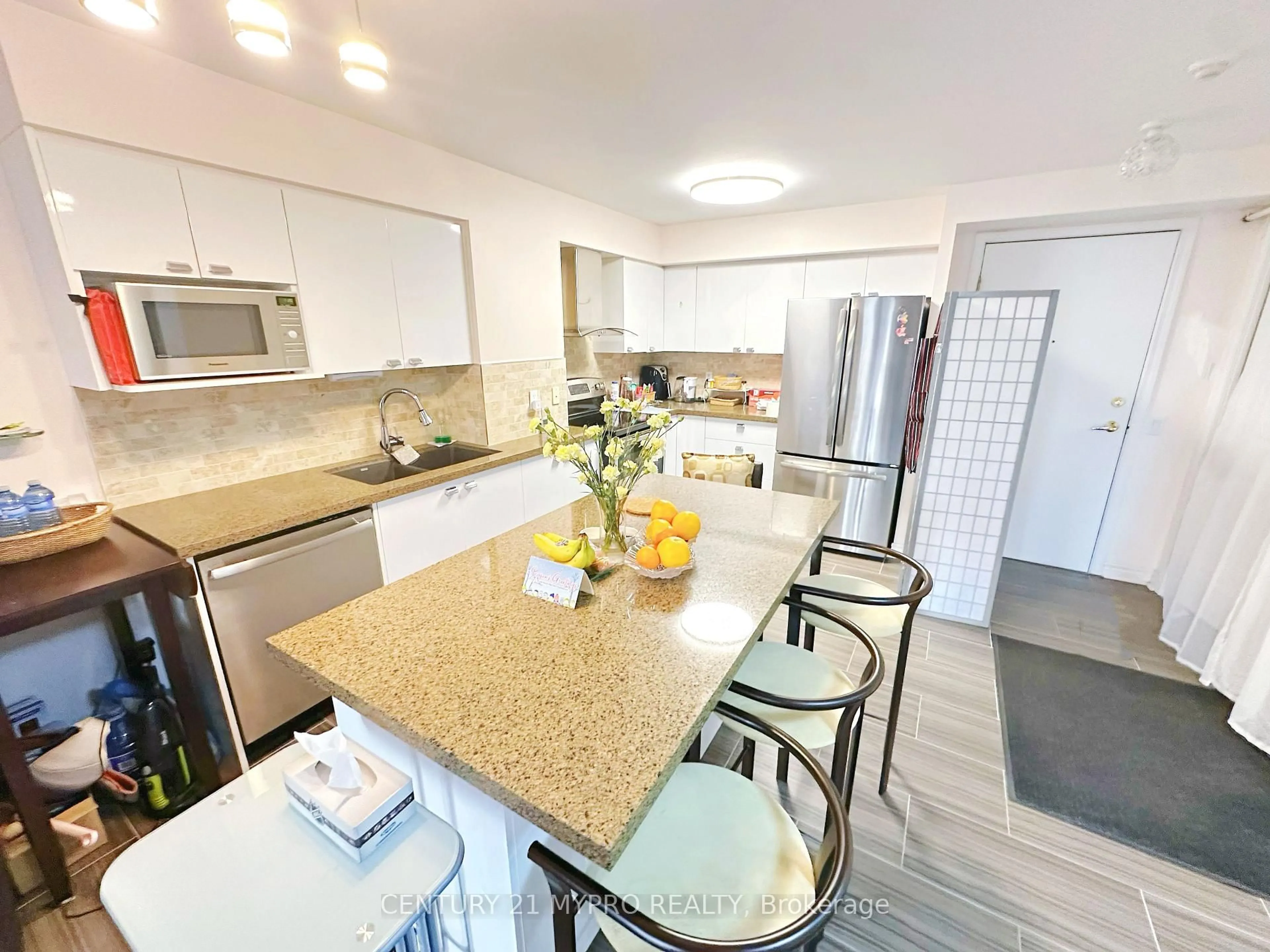 Open concept kitchen, ceramic/tile floor for 35 Kingsbridge Garden Circ #2201, Mississauga Ontario L5R 3Z5