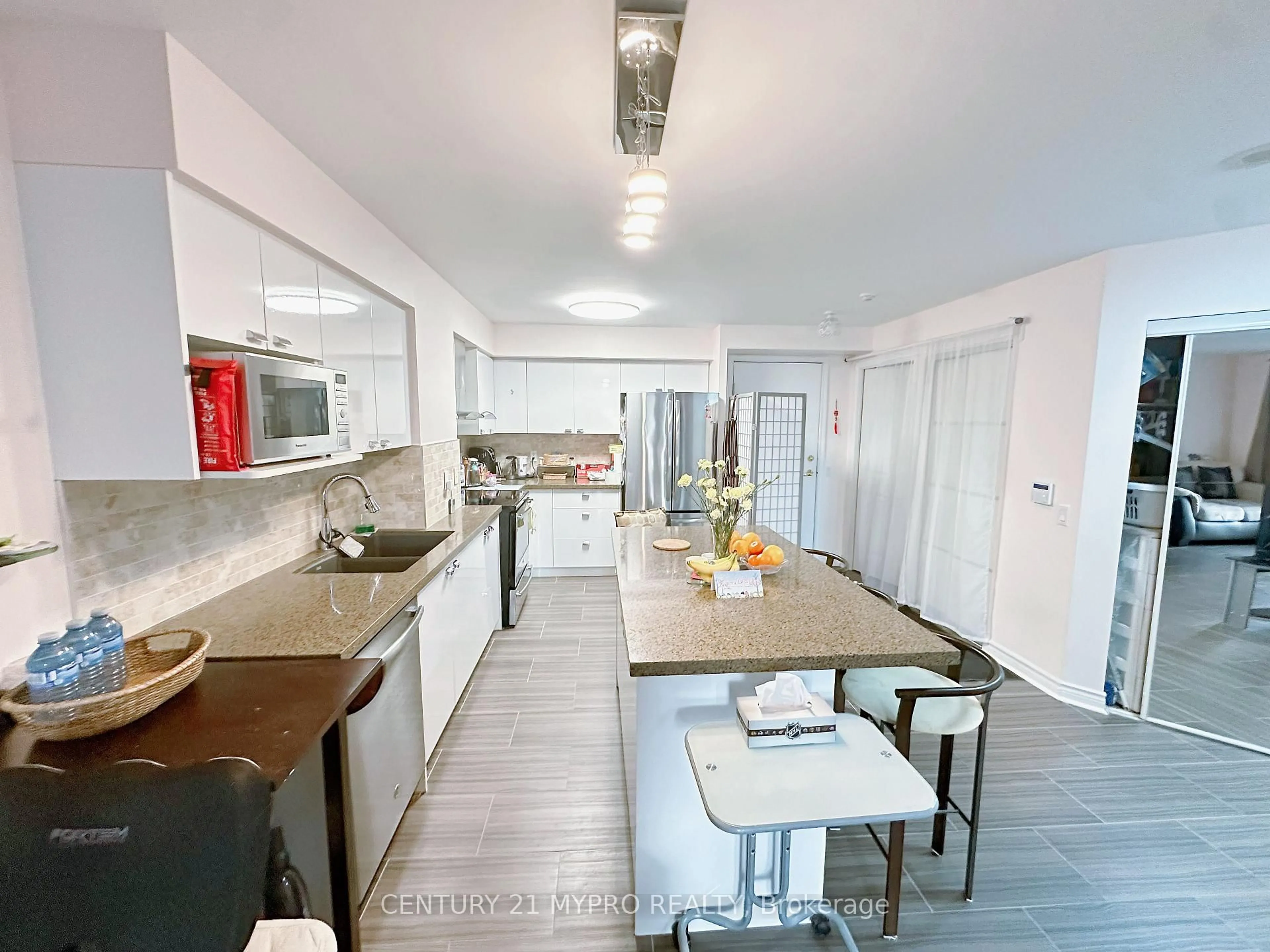 Open concept kitchen, ceramic/tile floor for 35 Kingsbridge Garden Circ #2201, Mississauga Ontario L5R 3Z5