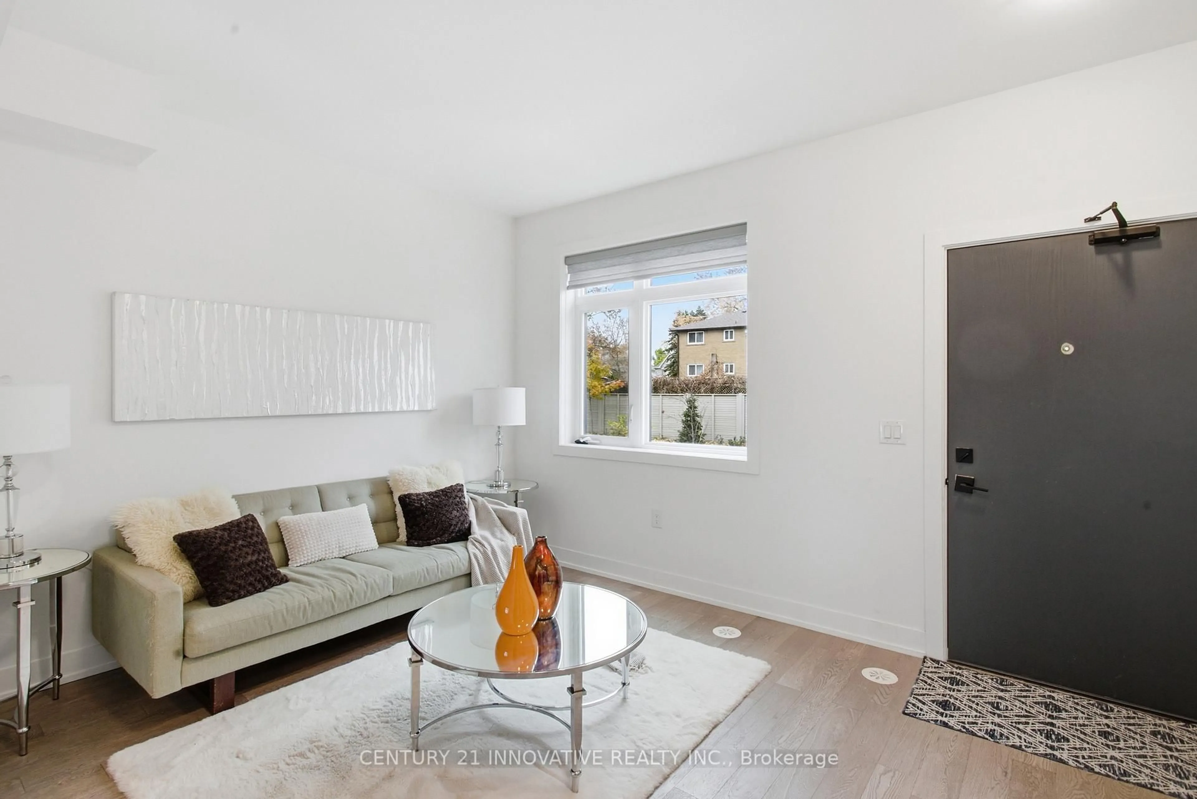 Living room with furniture, unknown for 1115 Douglas McCurdy Common St #104, Mississauga Ontario L5G 0C6