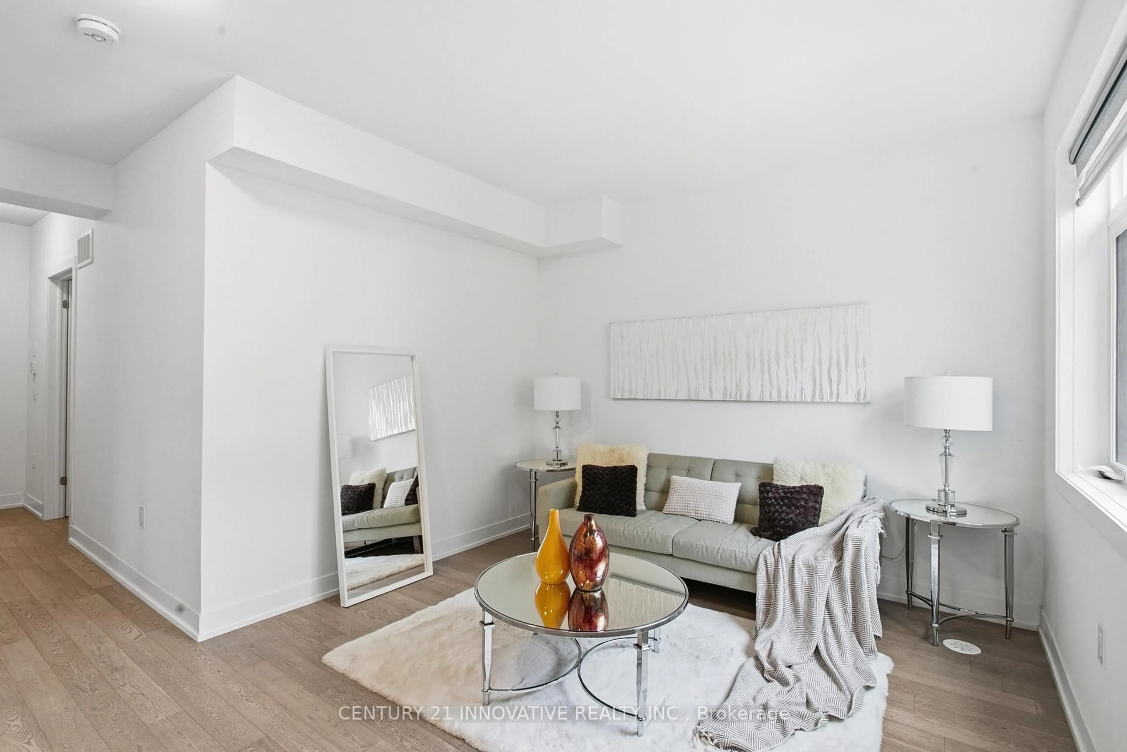 Living room with furniture, unknown for 1115 Douglas McCurdy Common St #104, Mississauga Ontario L5G 0C6