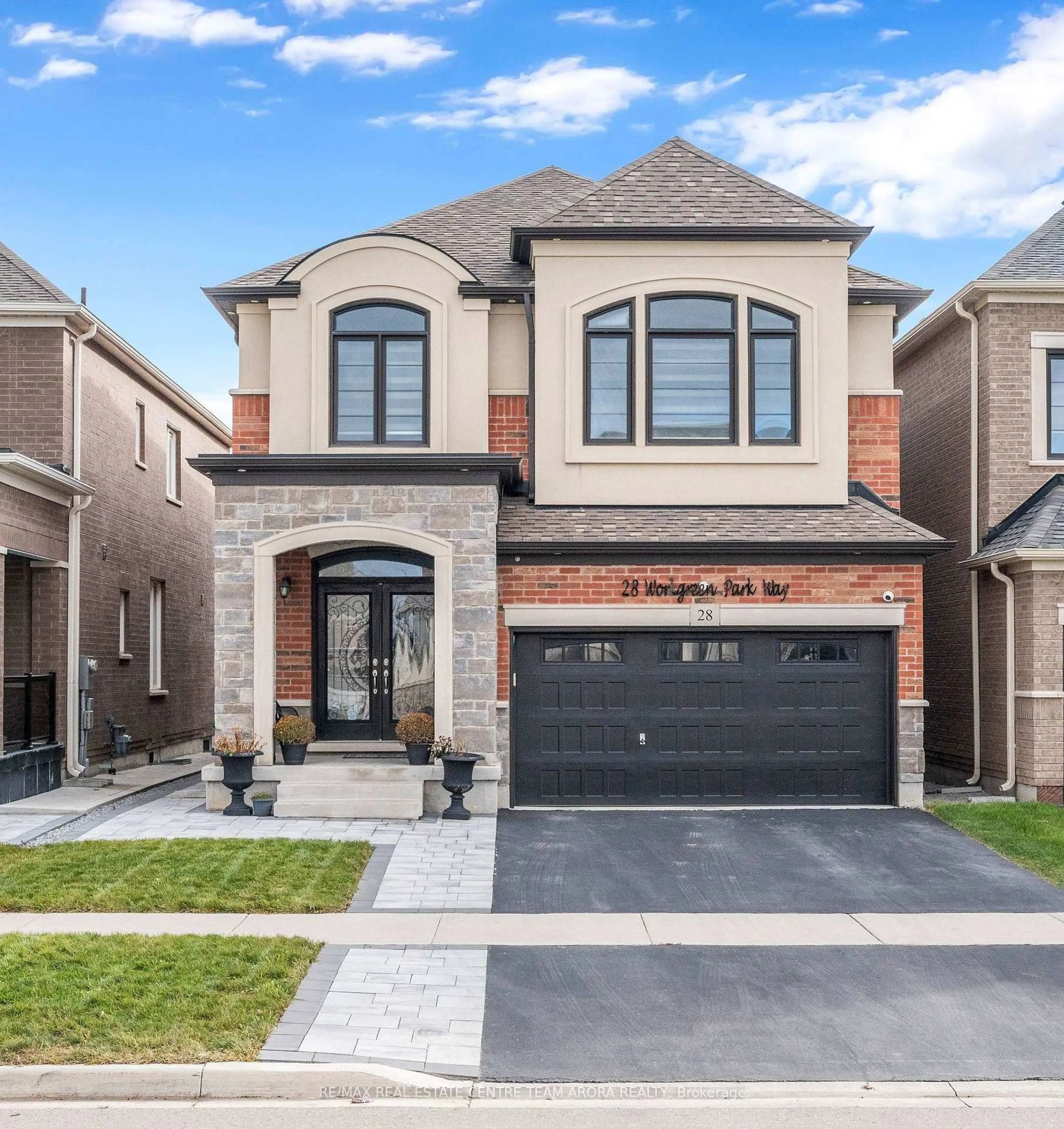 Home with brick exterior material, street for 28 Workgreen Pkwy, Brampton Ontario L6Y 6J5