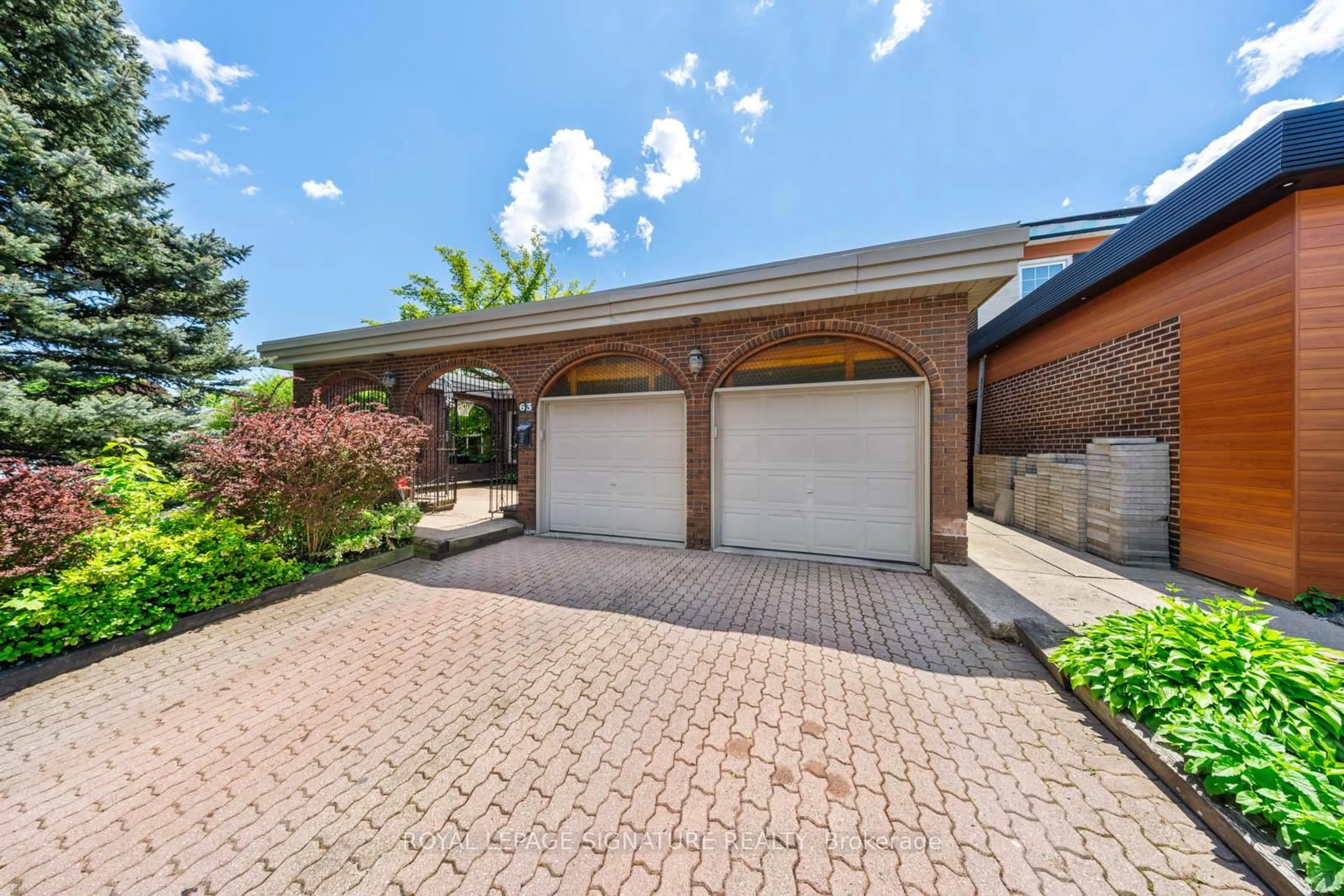Home with brick exterior material, street for 63 Collingdale Rd, Toronto Ontario M9V 3R2