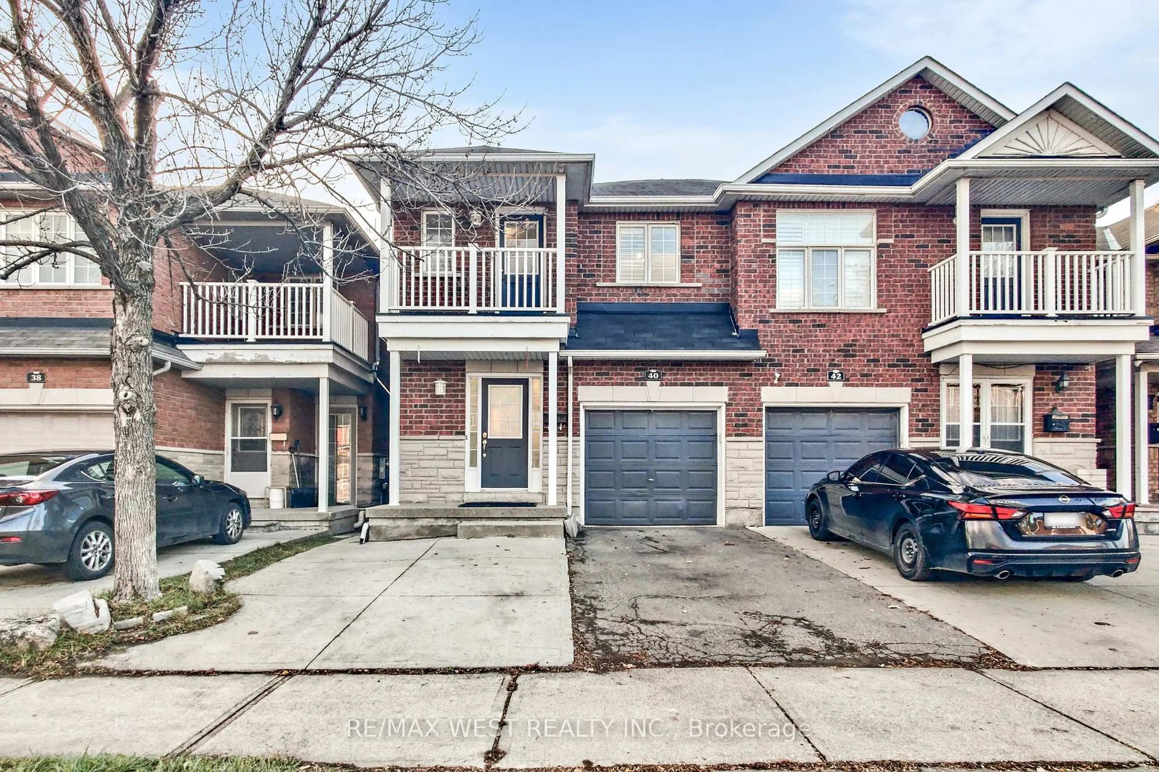 Home with brick exterior material, street for 40 San Gabriele Pl, Toronto Ontario M9L 3A4