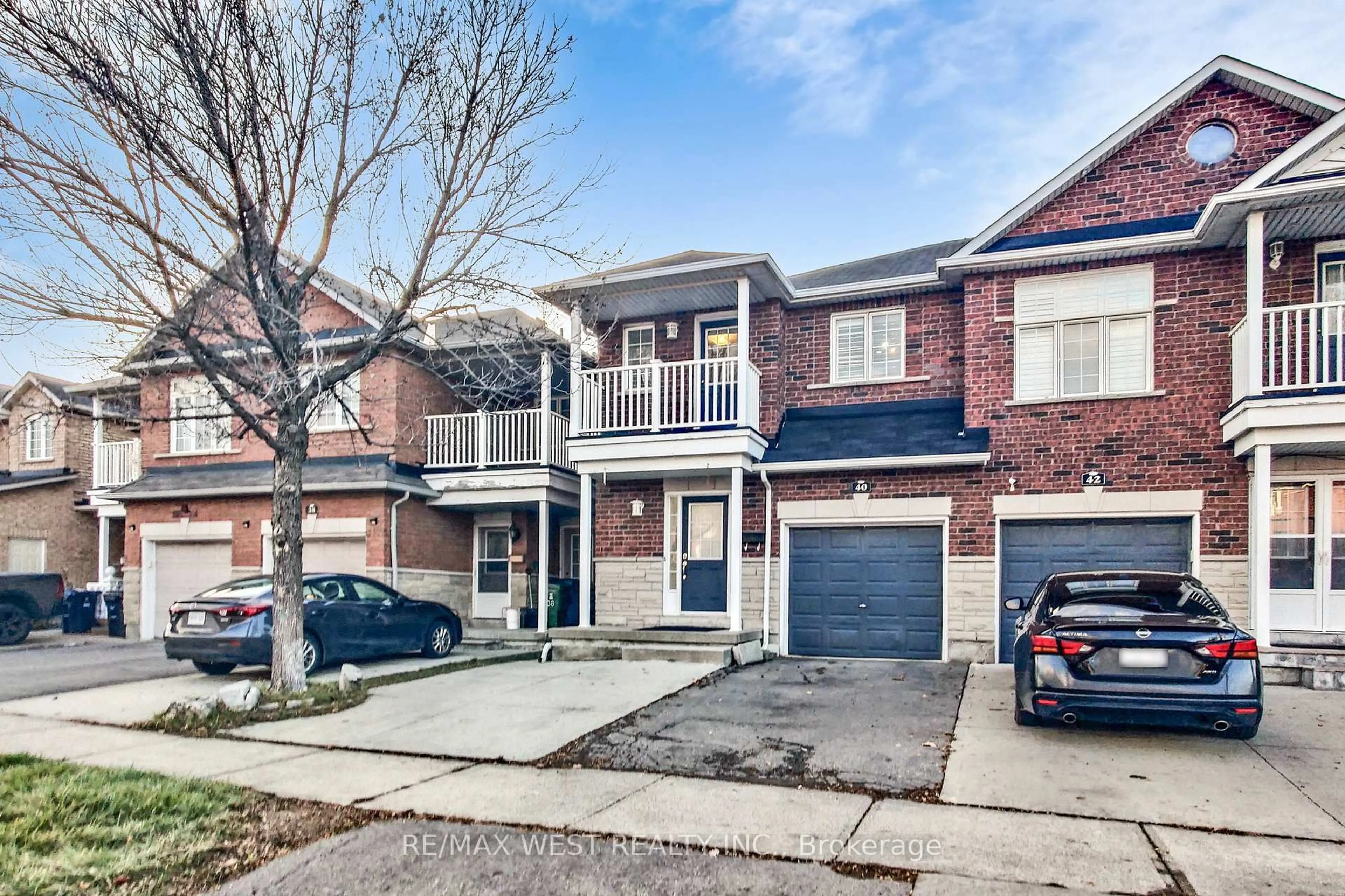 Home with brick exterior material, street for 40 San Gabriele Pl, Toronto Ontario M9L 3A4