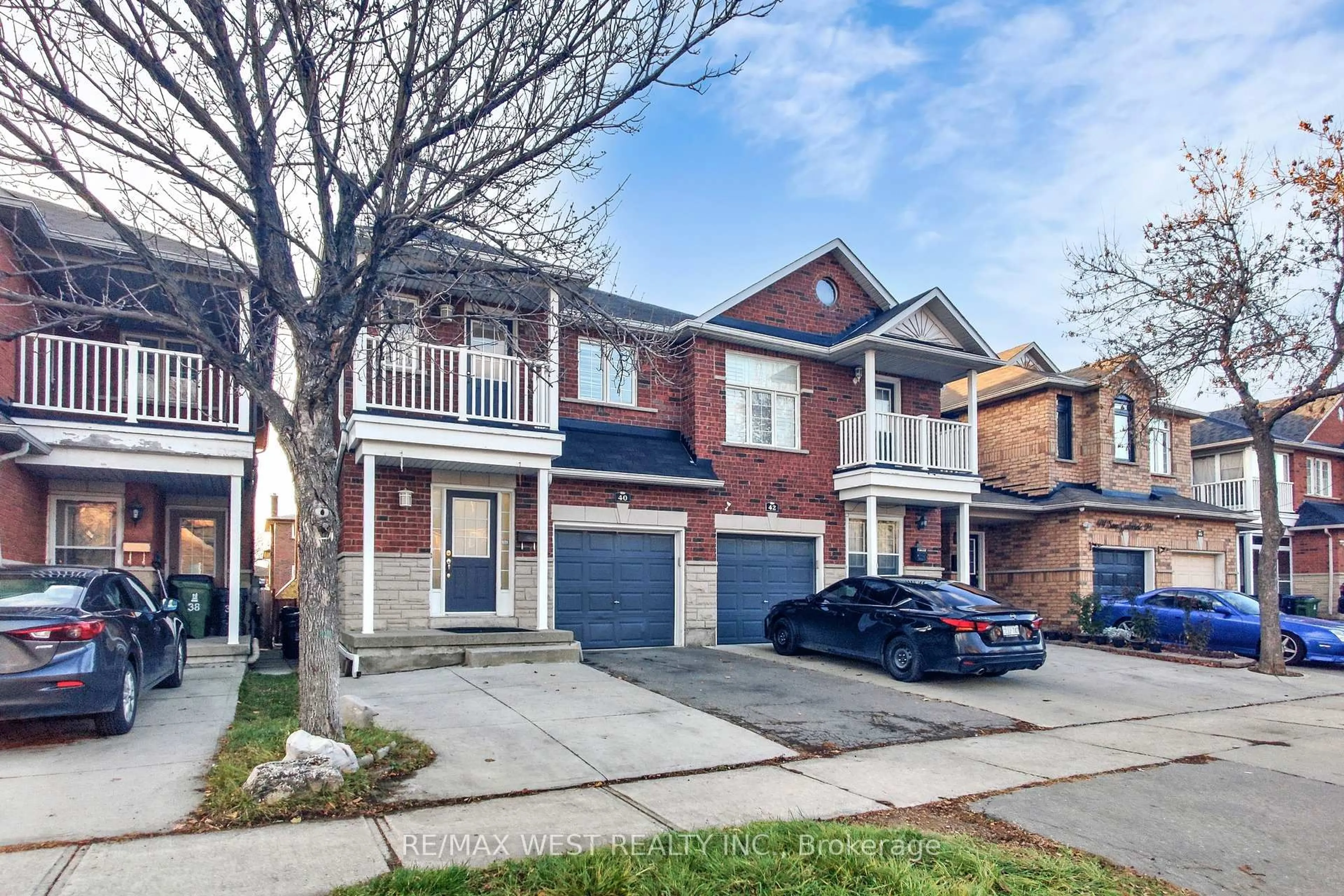 Home with brick exterior material, street for 40 San Gabriele Pl, Toronto Ontario M9L 3A4