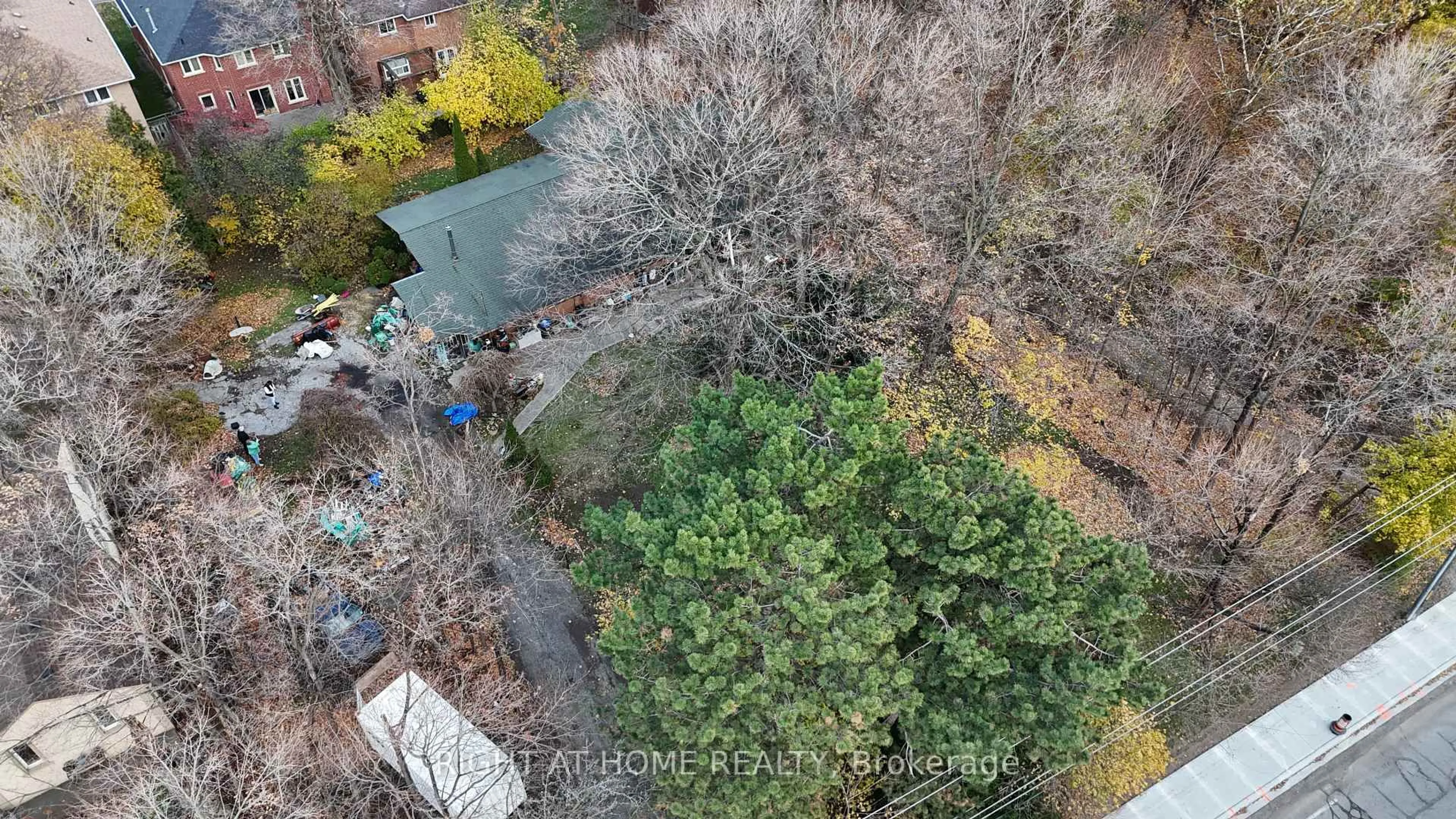 A pic from outside/outdoor area/front of a property/back of a property/a pic from drone, forest/trees view for 2471 Fifth Line, Mississauga Ontario L5K 1V9