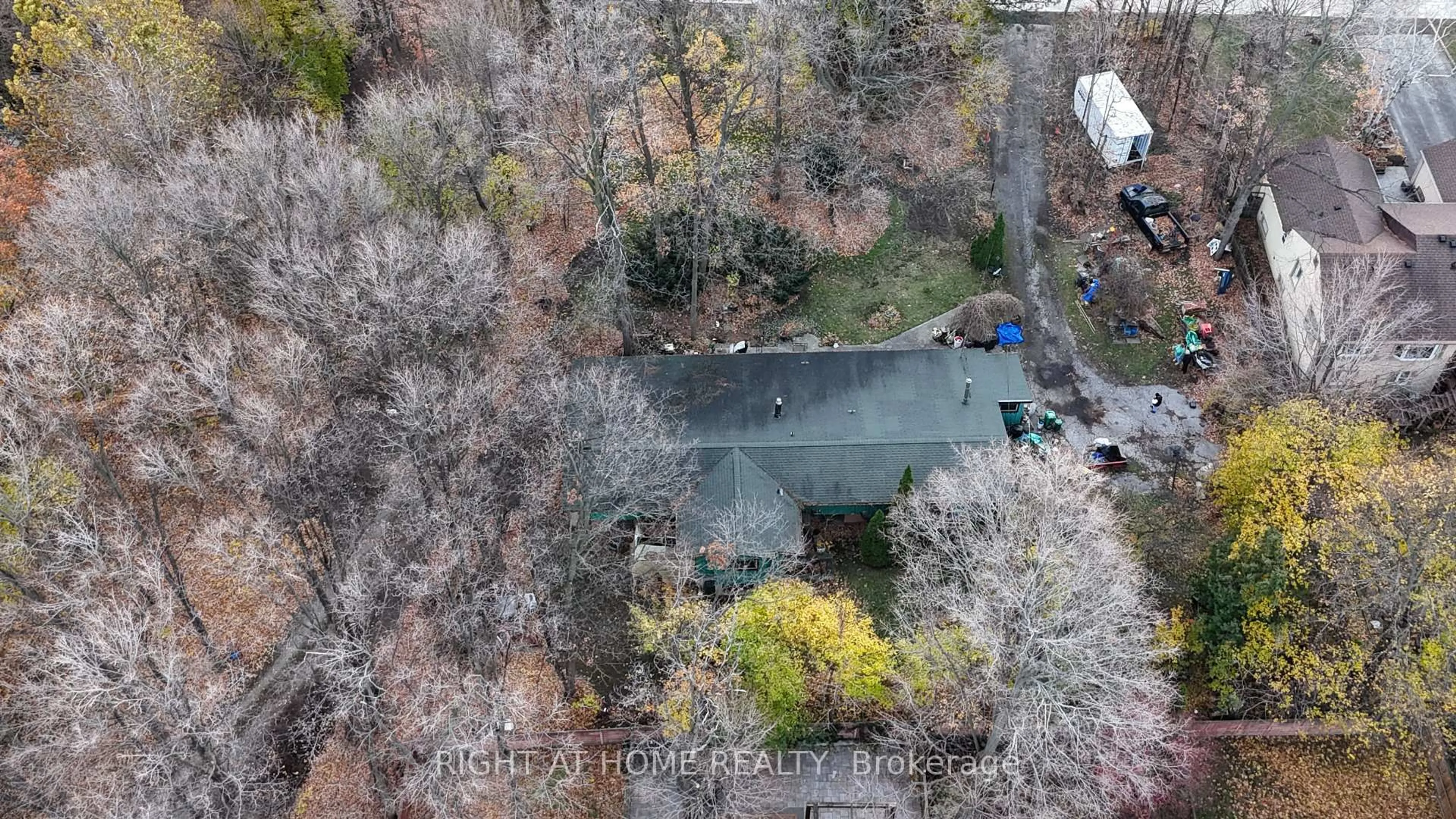 A pic from outside/outdoor area/front of a property/back of a property/a pic from drone, forest/trees view for 2471 Fifth Line, Mississauga Ontario L5K 1V9