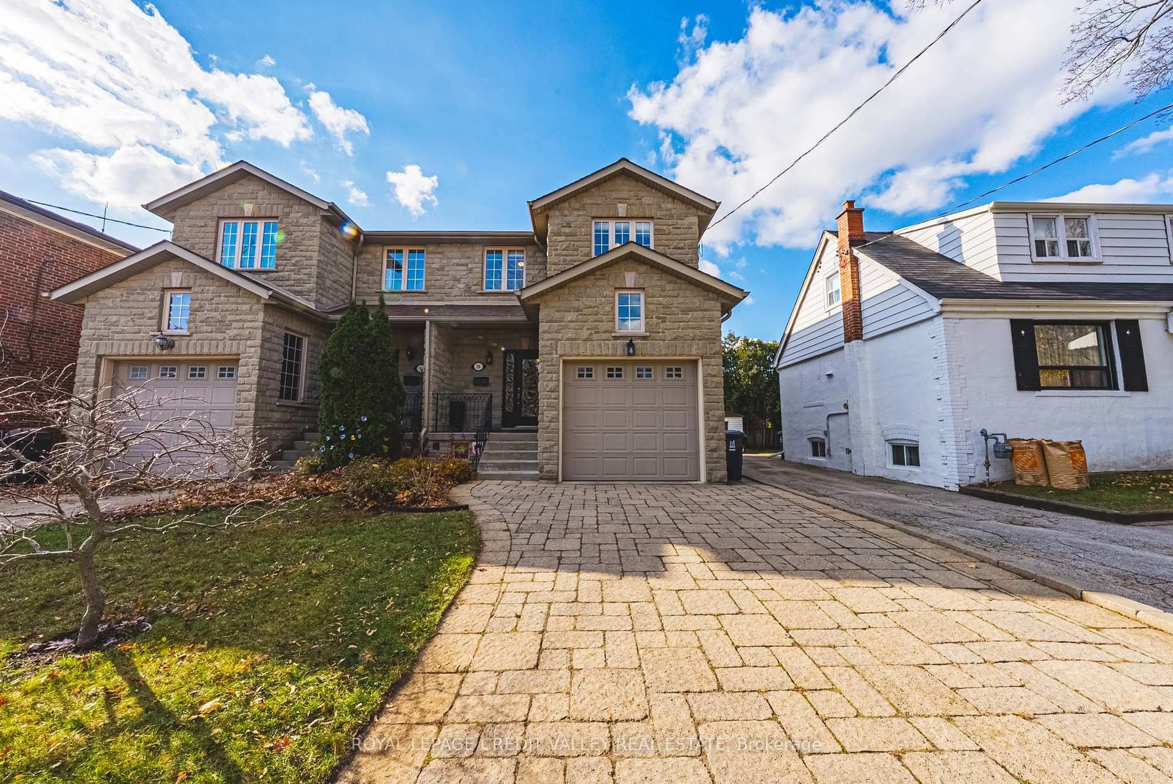 Home with brick exterior material, street for 36 Lunness Rd, Toronto Ontario M8W 4M4