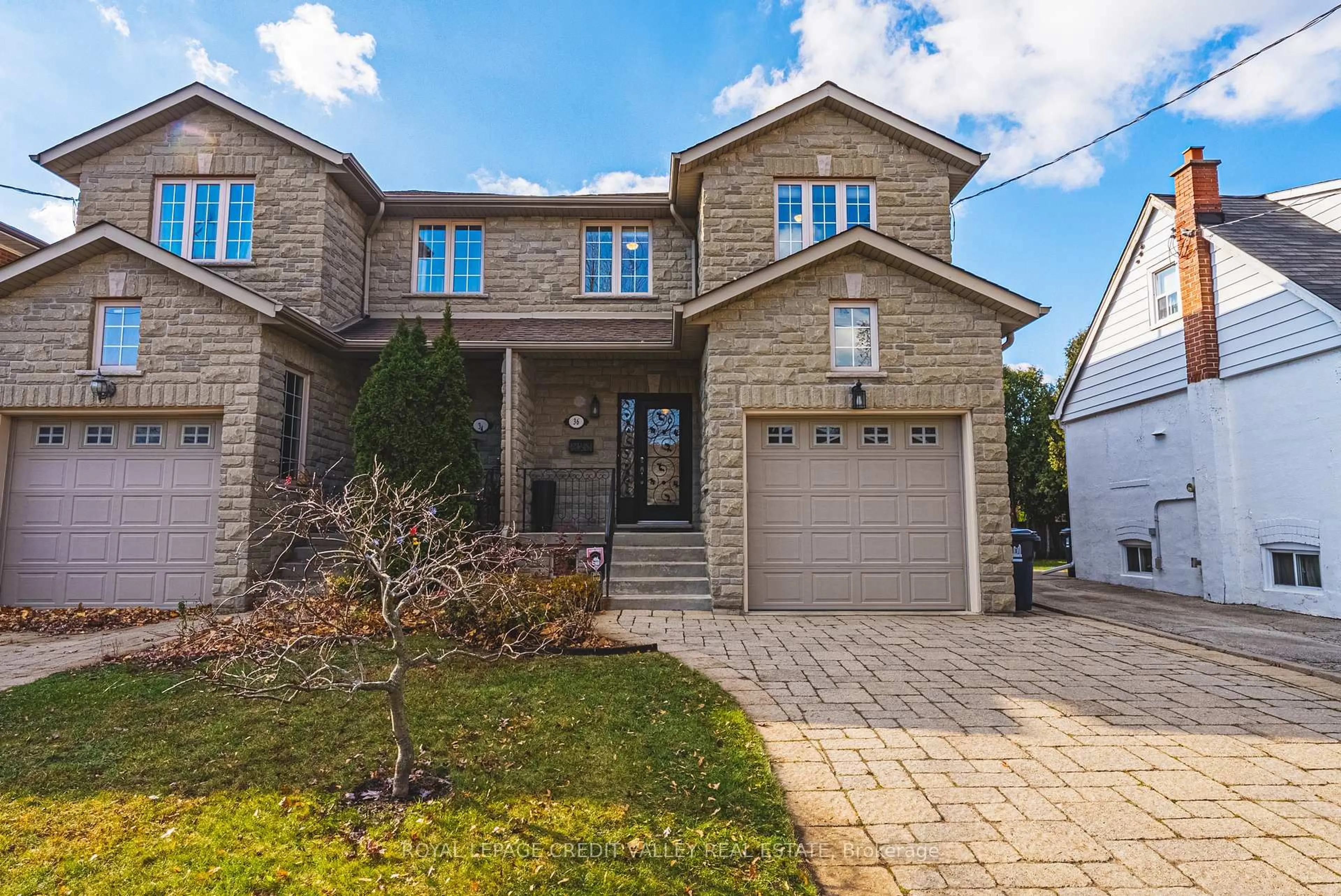 Home with brick exterior material, street for 36 Lunness Rd, Toronto Ontario M8W 4M4
