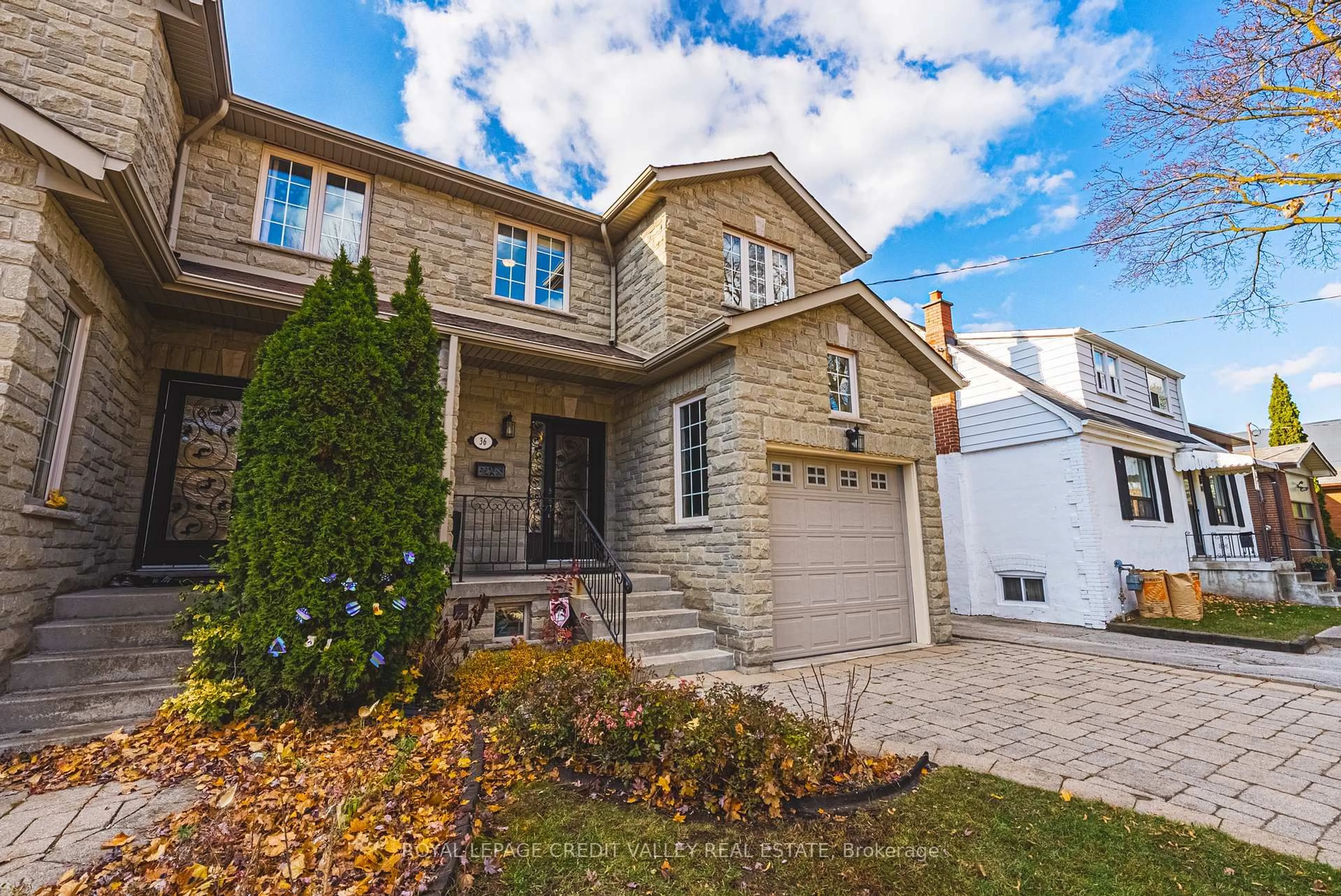 Home with brick exterior material, street for 36 Lunness Rd, Toronto Ontario M8W 4M4