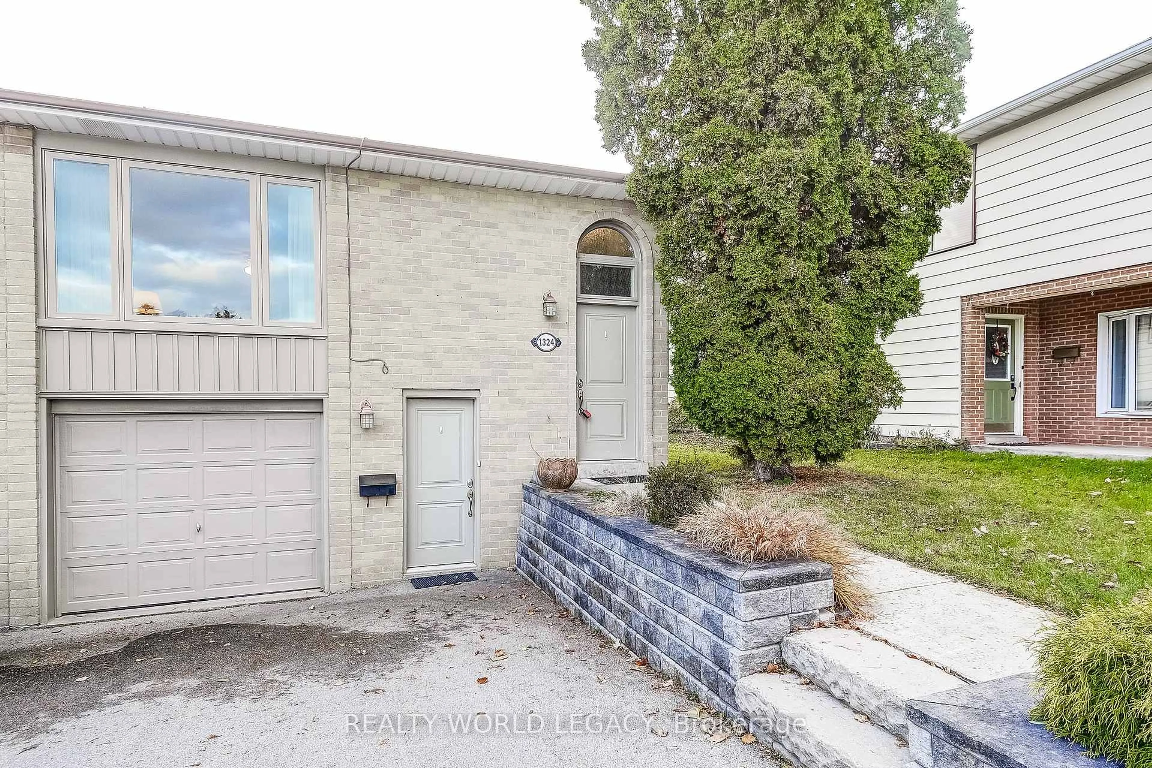 Home with brick exterior material, street for 1324 Consort Cres, Burlington Ontario L7M 1J7