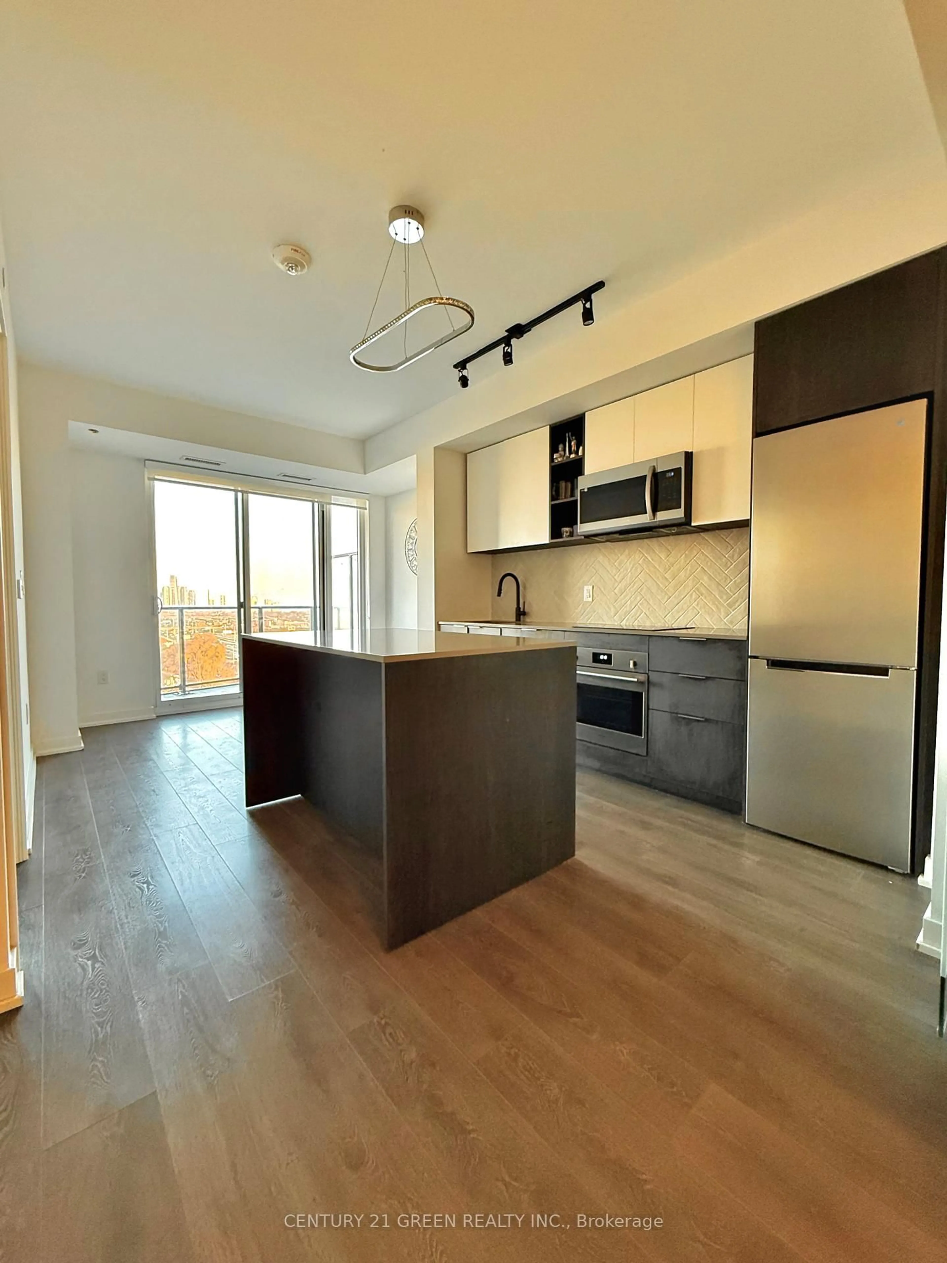 Open concept kitchen, wood/laminate floor for 36 Zorra St #1005, Toronto Ontario M8Z 0G5