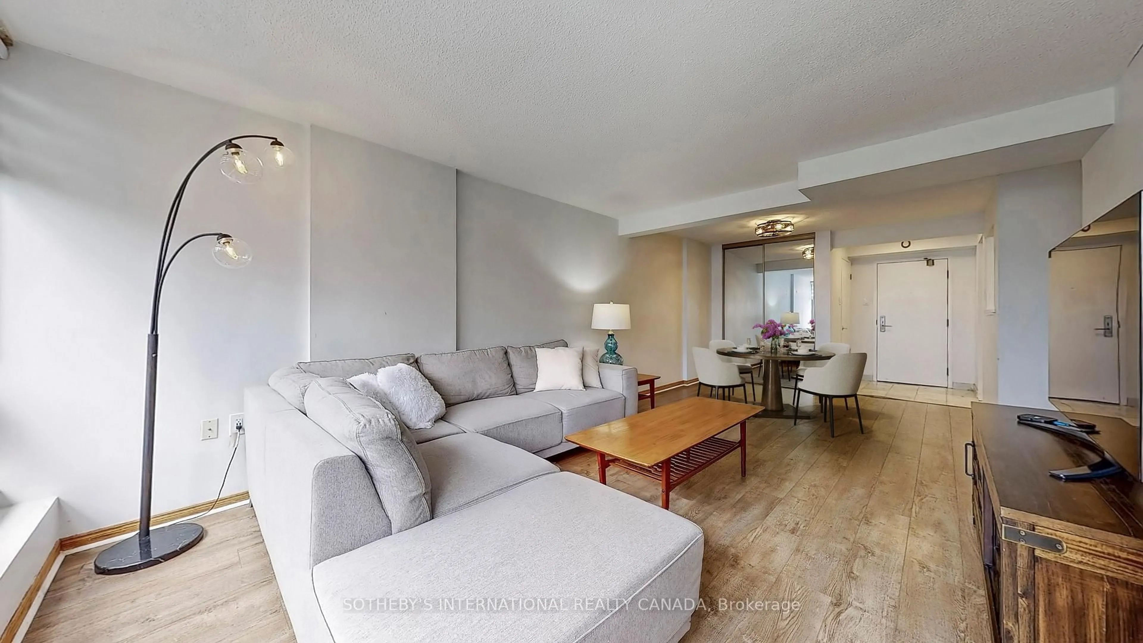 Living room with furniture, unknown for 25 Fairview Rd #406, Mississauga Ontario L5B 3Y8