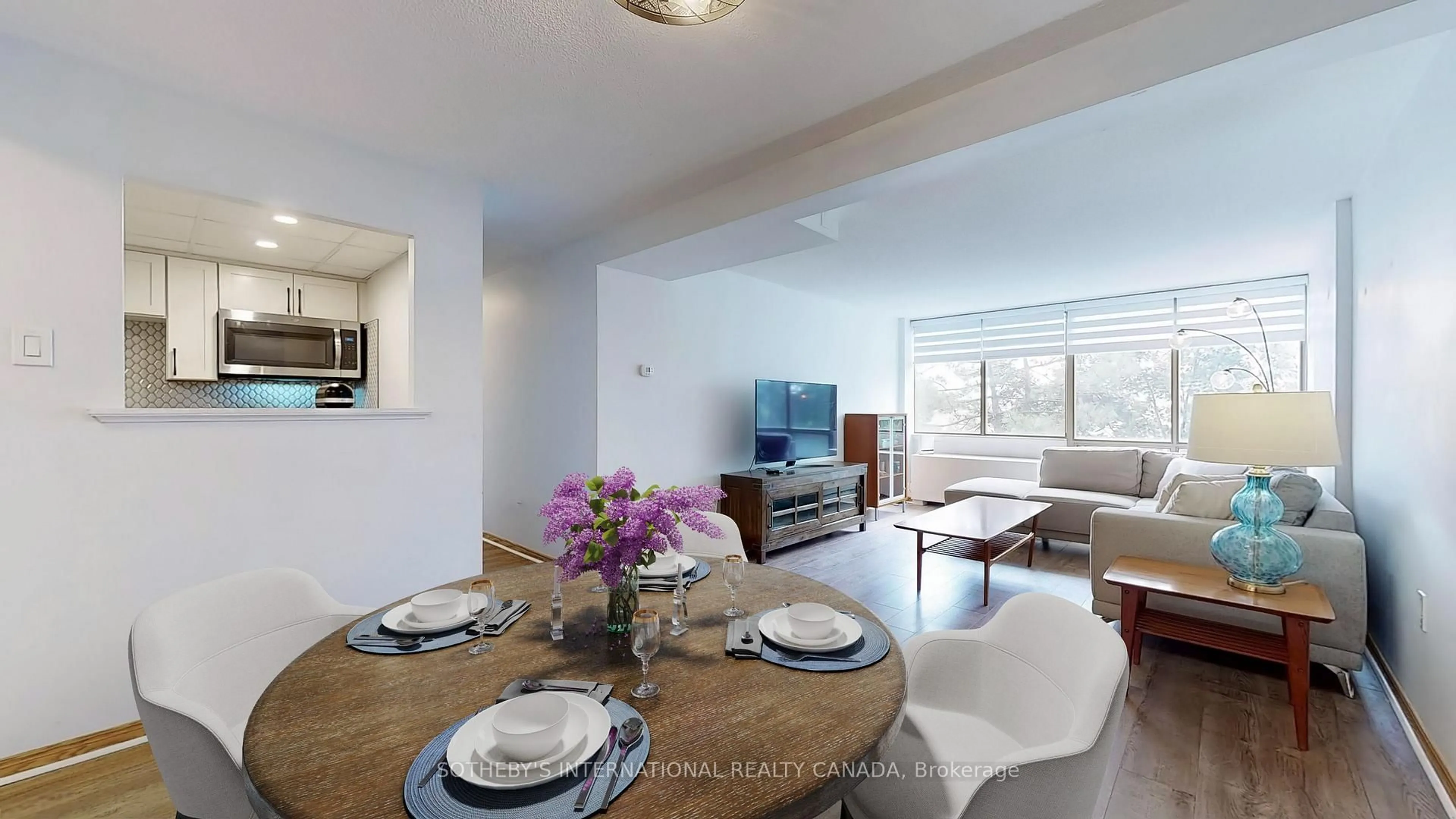 Dining room, wood/laminate floor for 25 Fairview Rd #406, Mississauga Ontario L5B 3Y8