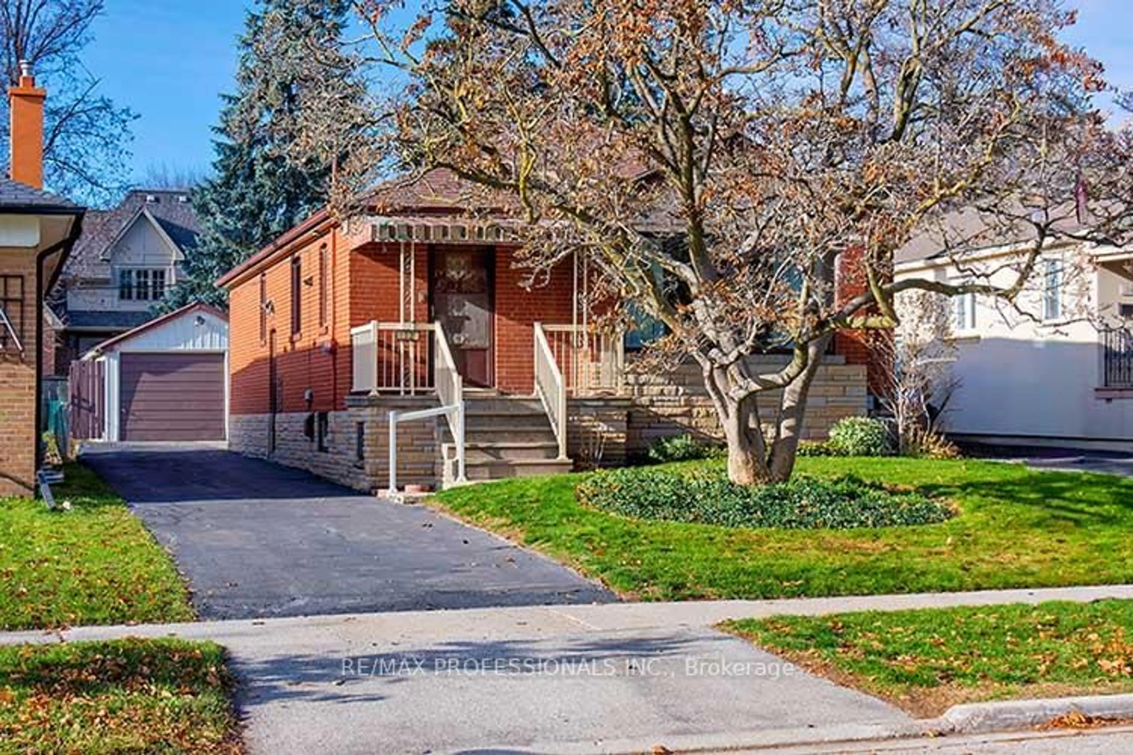 Home with brick exterior material, street for 32 Northampton Dr, Toronto Ontario M9B 4S6