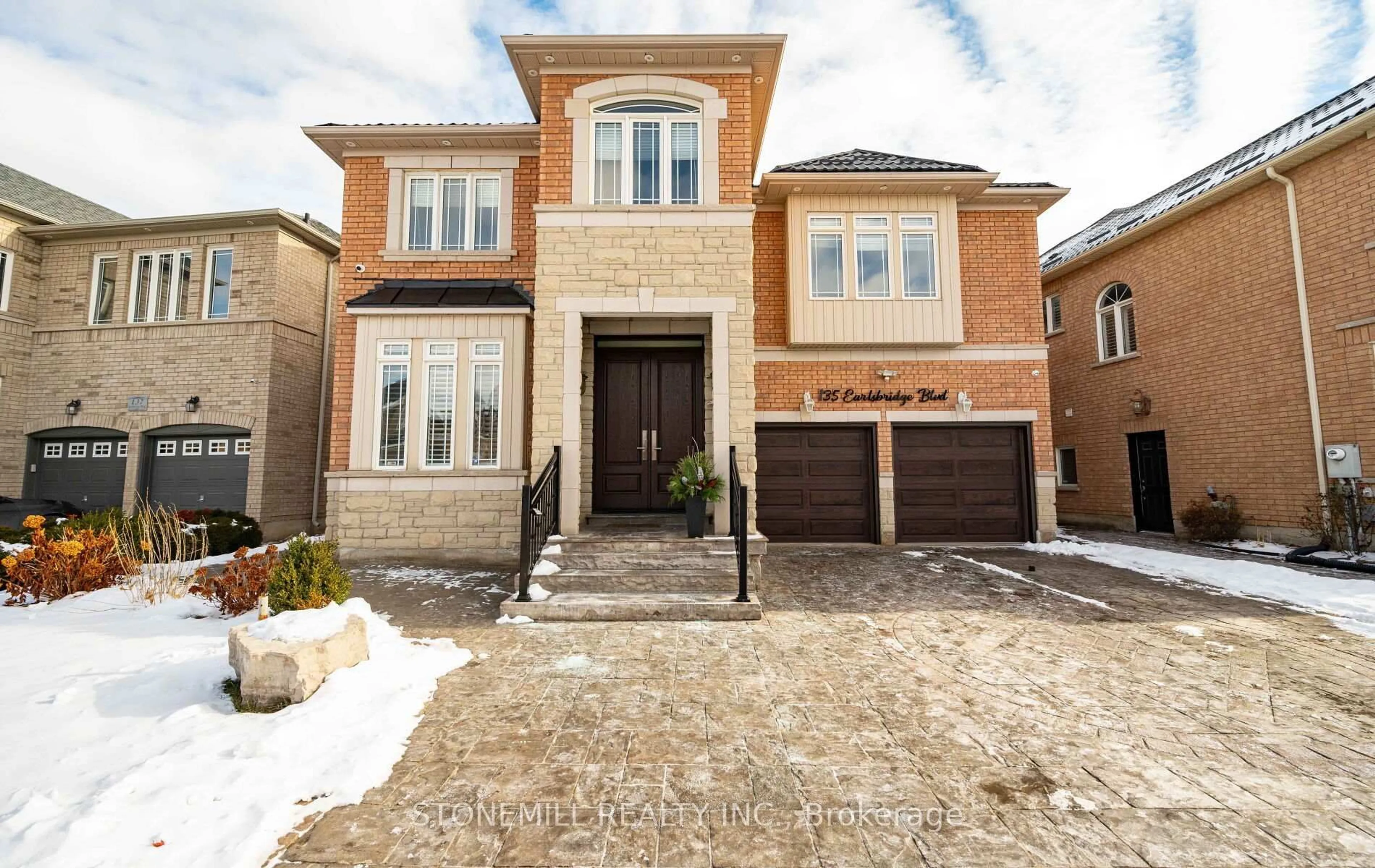 Home with brick exterior material, street for 135 Earlsbridge Blvd, Brampton Ontario L7A 3T7
