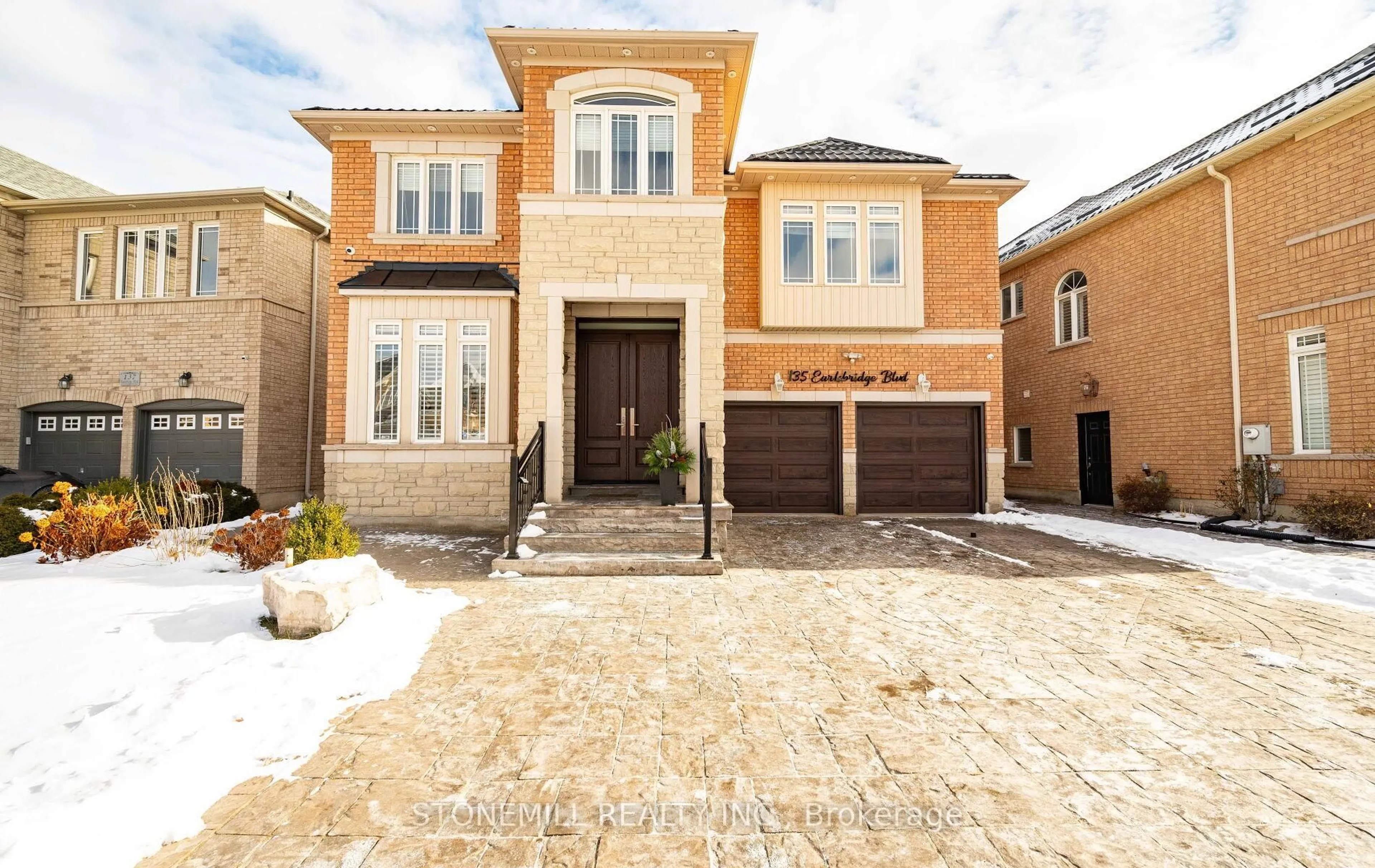 Home with brick exterior material, street for 135 Earlsbridge Blvd, Brampton Ontario L7A 3T7