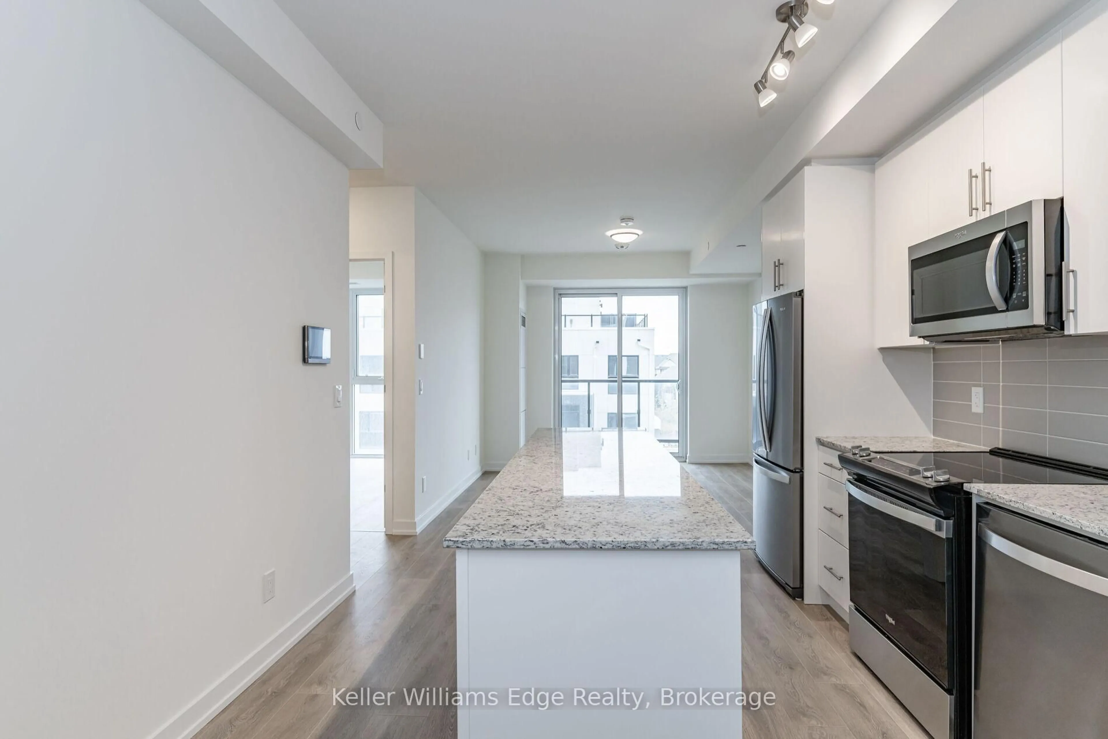Open concept kitchen, ceramic/tile floor for 345 Wheat Boom Dr #401, Oakville Ontario L6H 0R4