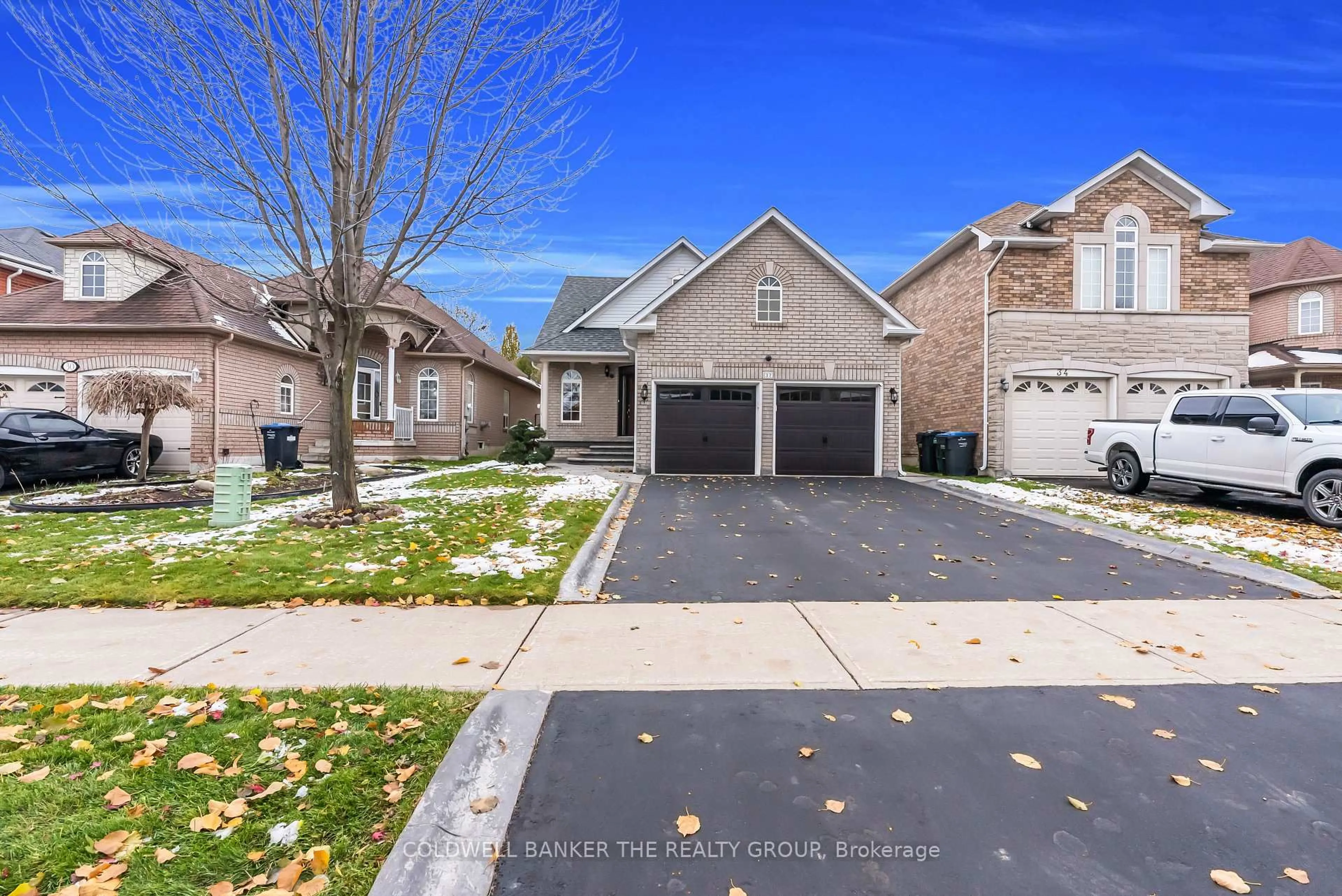 A pic from outside/outdoor area/front of a property/back of a property/a pic from drone, street for 32 Robertson Davies Dr, Brampton Ontario L7A 1K3