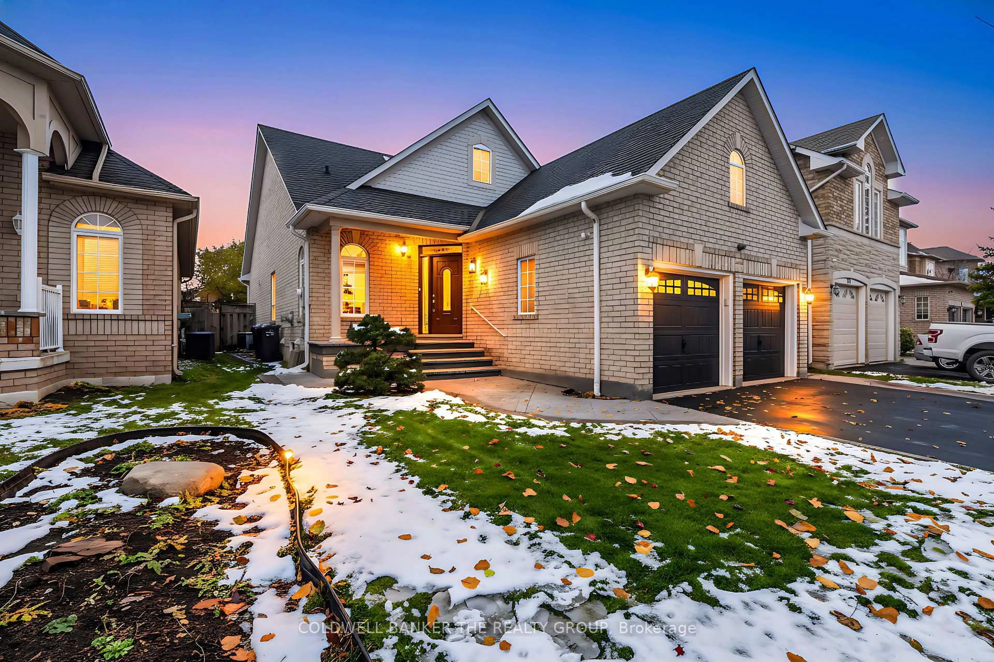 Home with brick exterior material, street for 32 Robertson Davies Dr, Brampton Ontario L7A 1K3