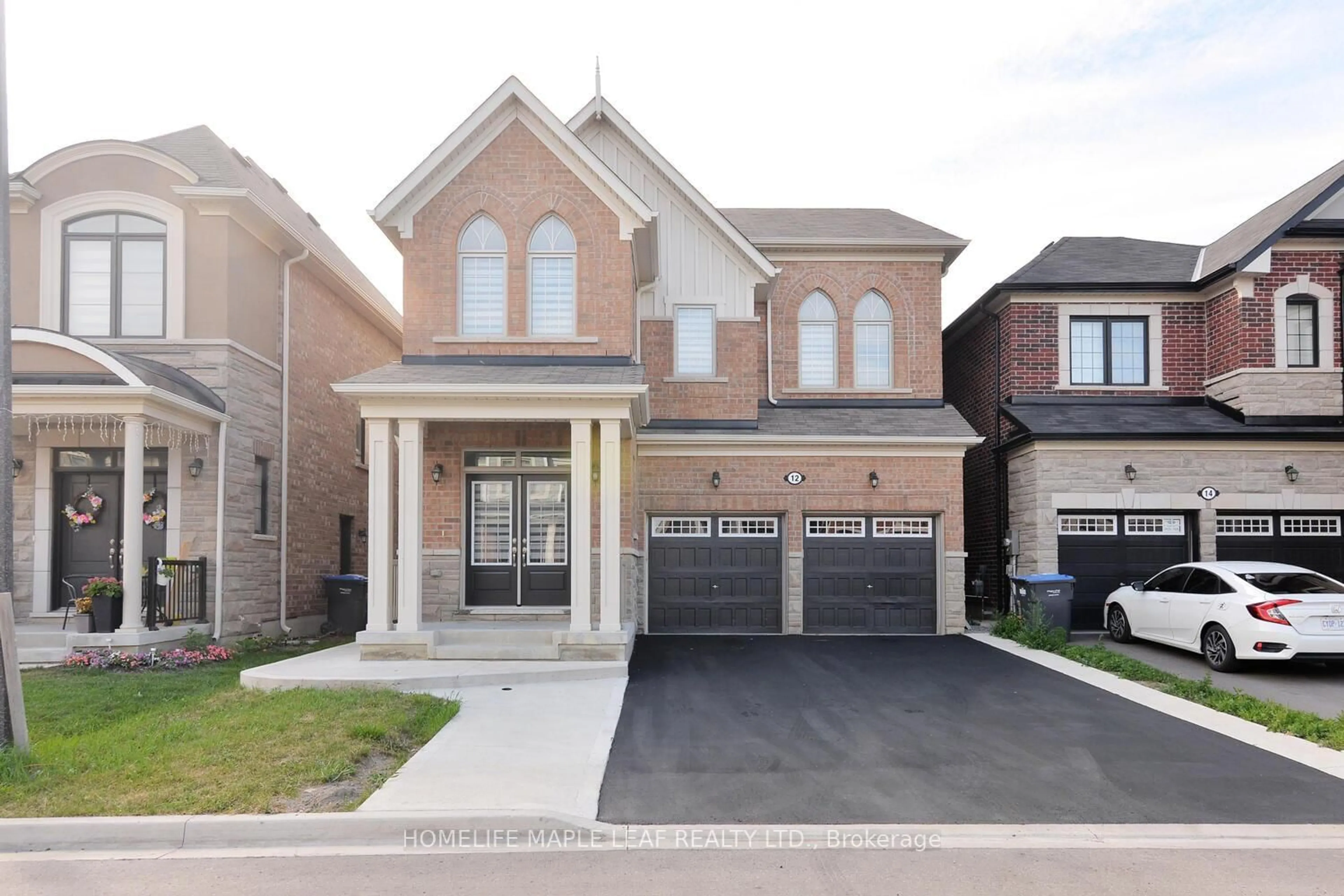 Home with brick exterior material, street for 12 Eberly Woods Dr, Caledon Ontario L7C 4H8
