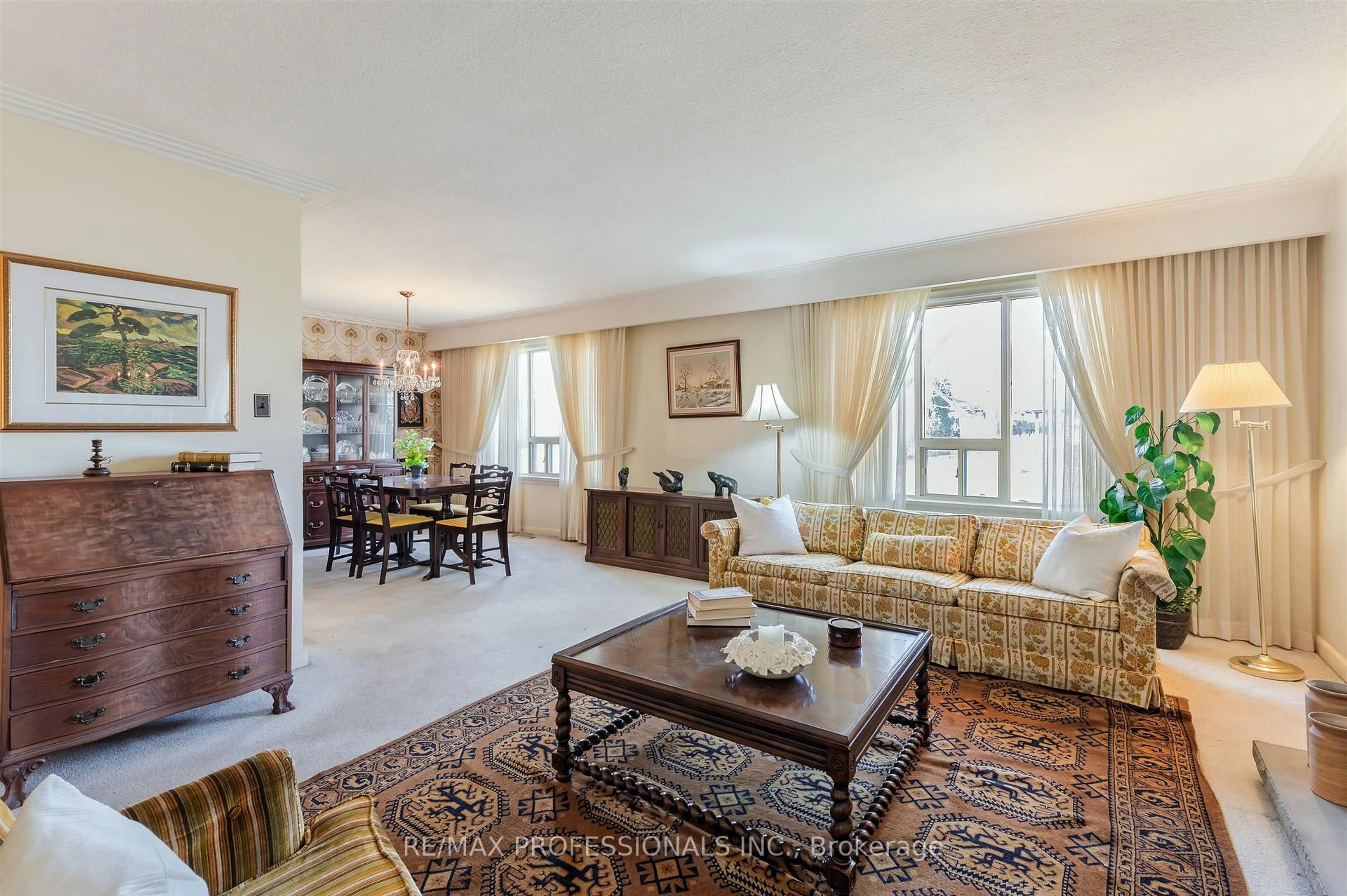 Living room with furniture, unknown for 67 Prince George Dr, Toronto Ontario M9A 1Y5