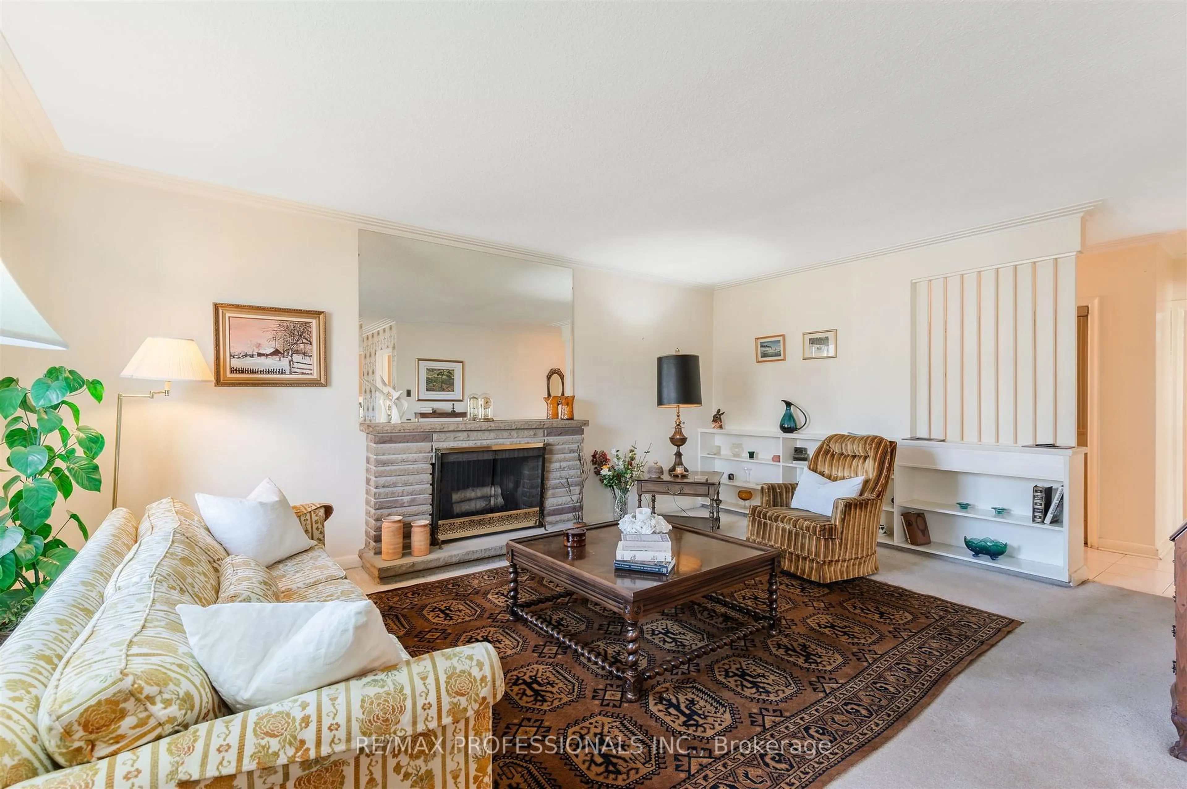 Living room with furniture, unknown for 67 Prince George Dr, Toronto Ontario M9A 1Y5