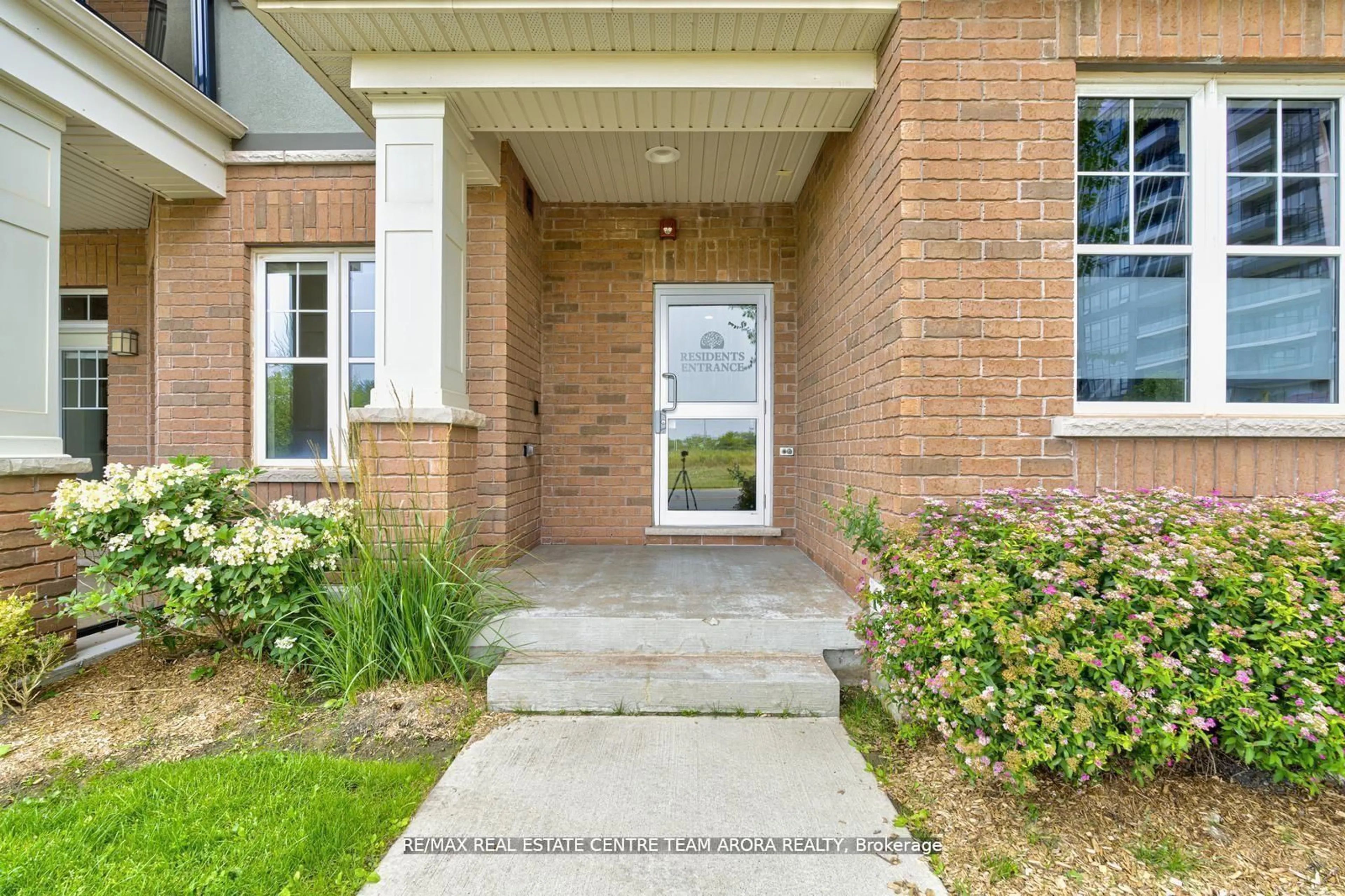 Home with brick exterior material, street for 2326 Taunton Rd #303, Oakville Ontario L6H 0L3